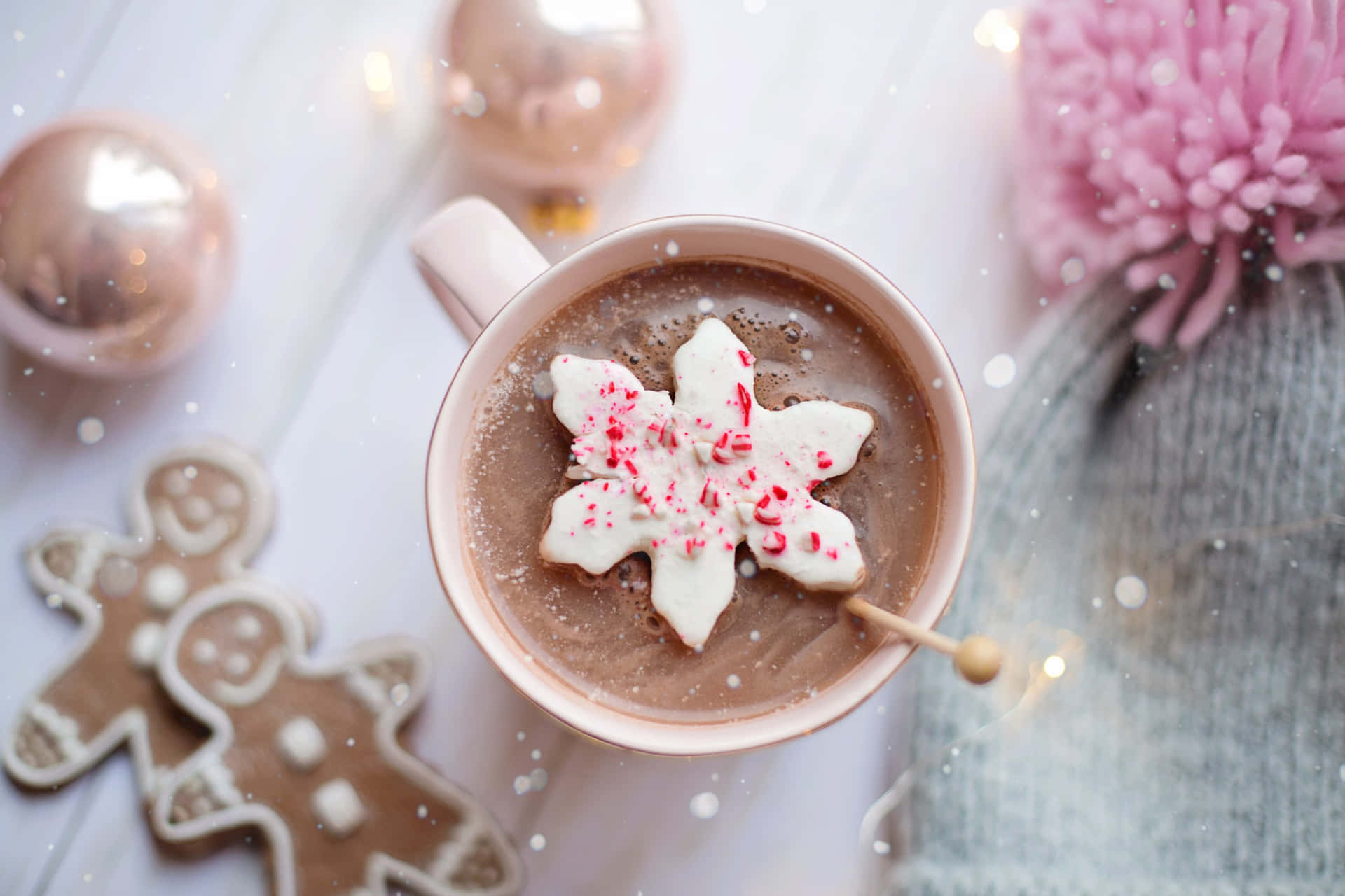 A steaming cup of hot chocolate with whipped cream and chocolate shavings Wallpaper