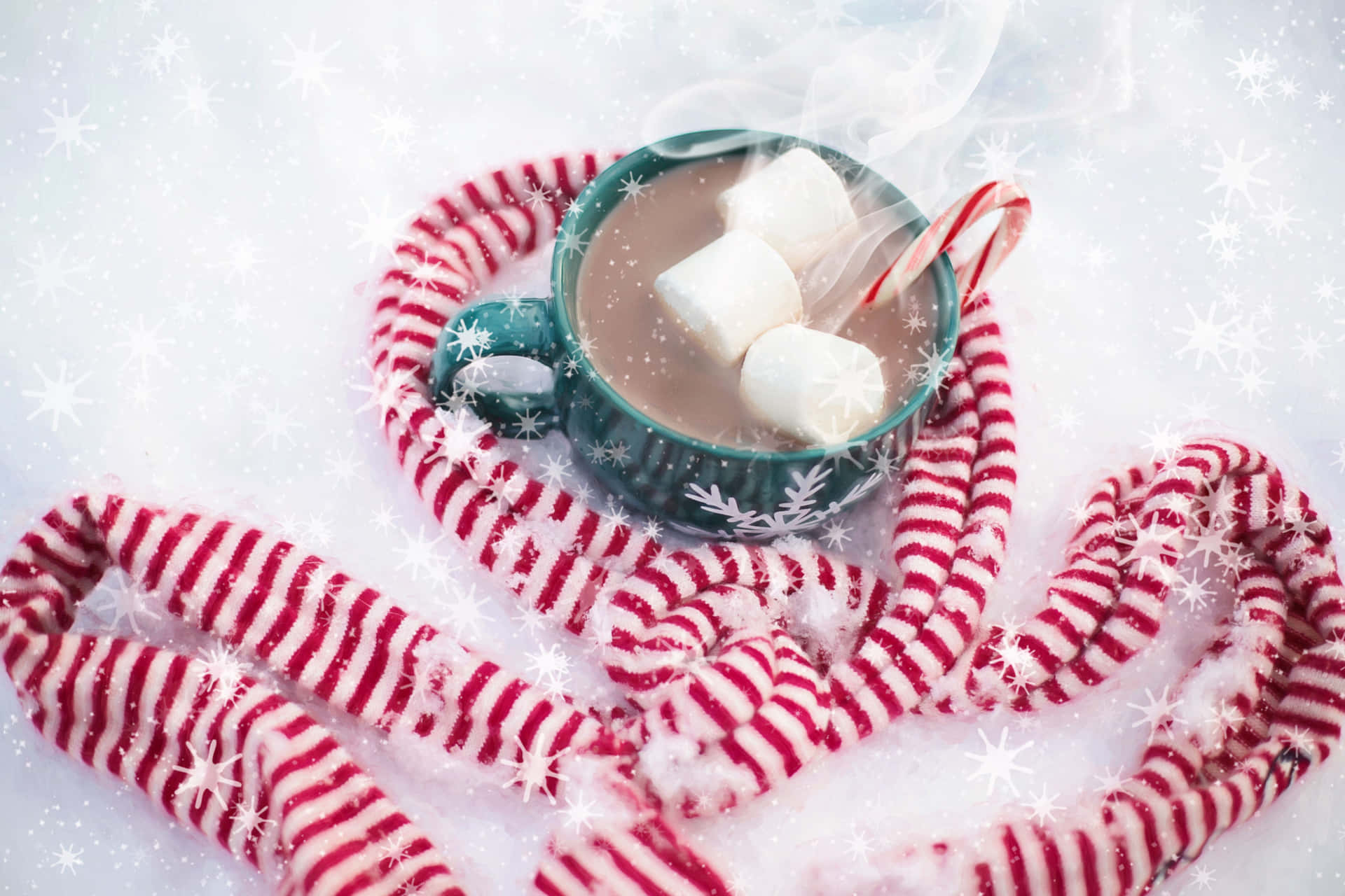 A steaming cup of hot chocolate with marshmallows Wallpaper