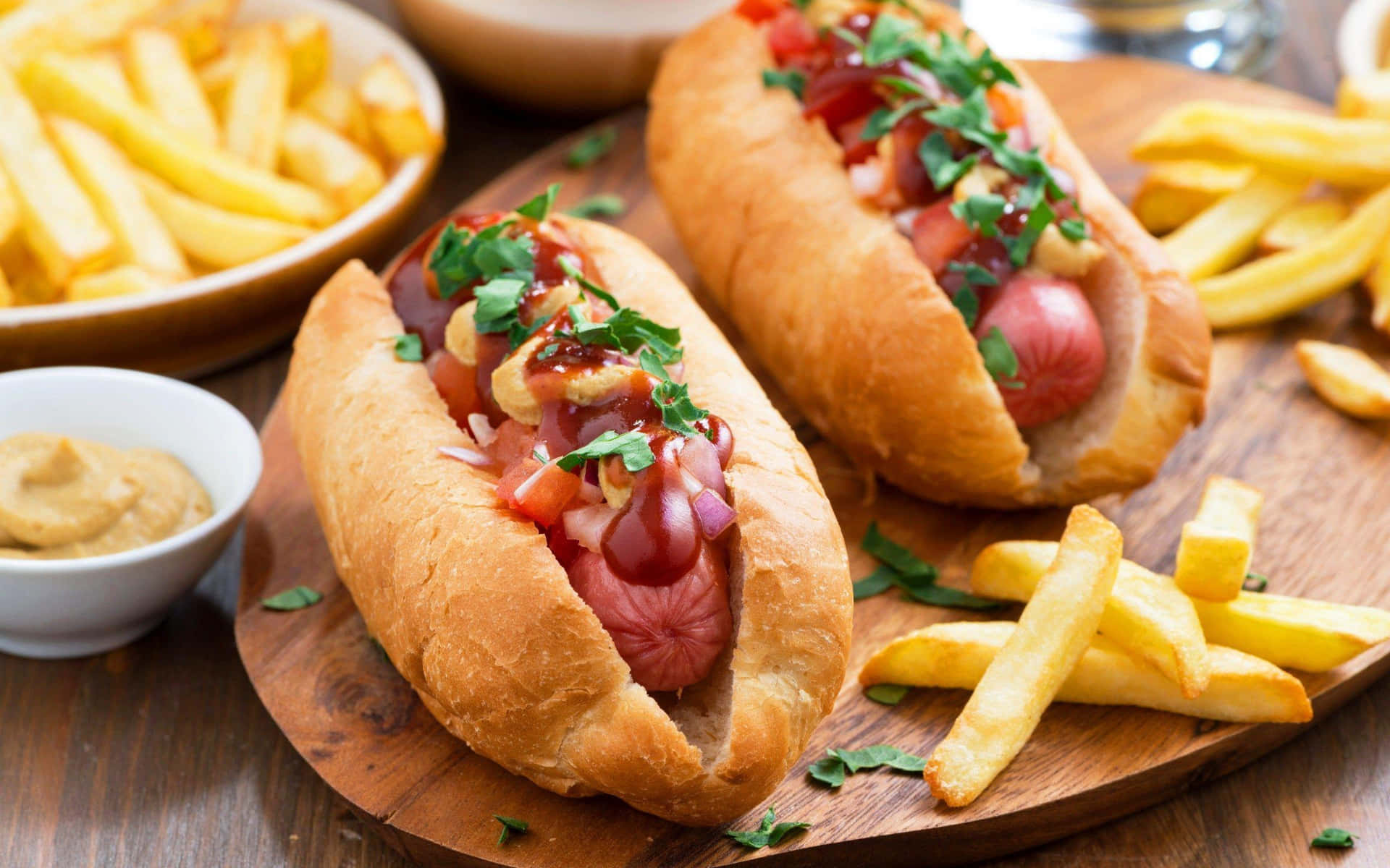 Two Hot Dogs On A Wooden Board