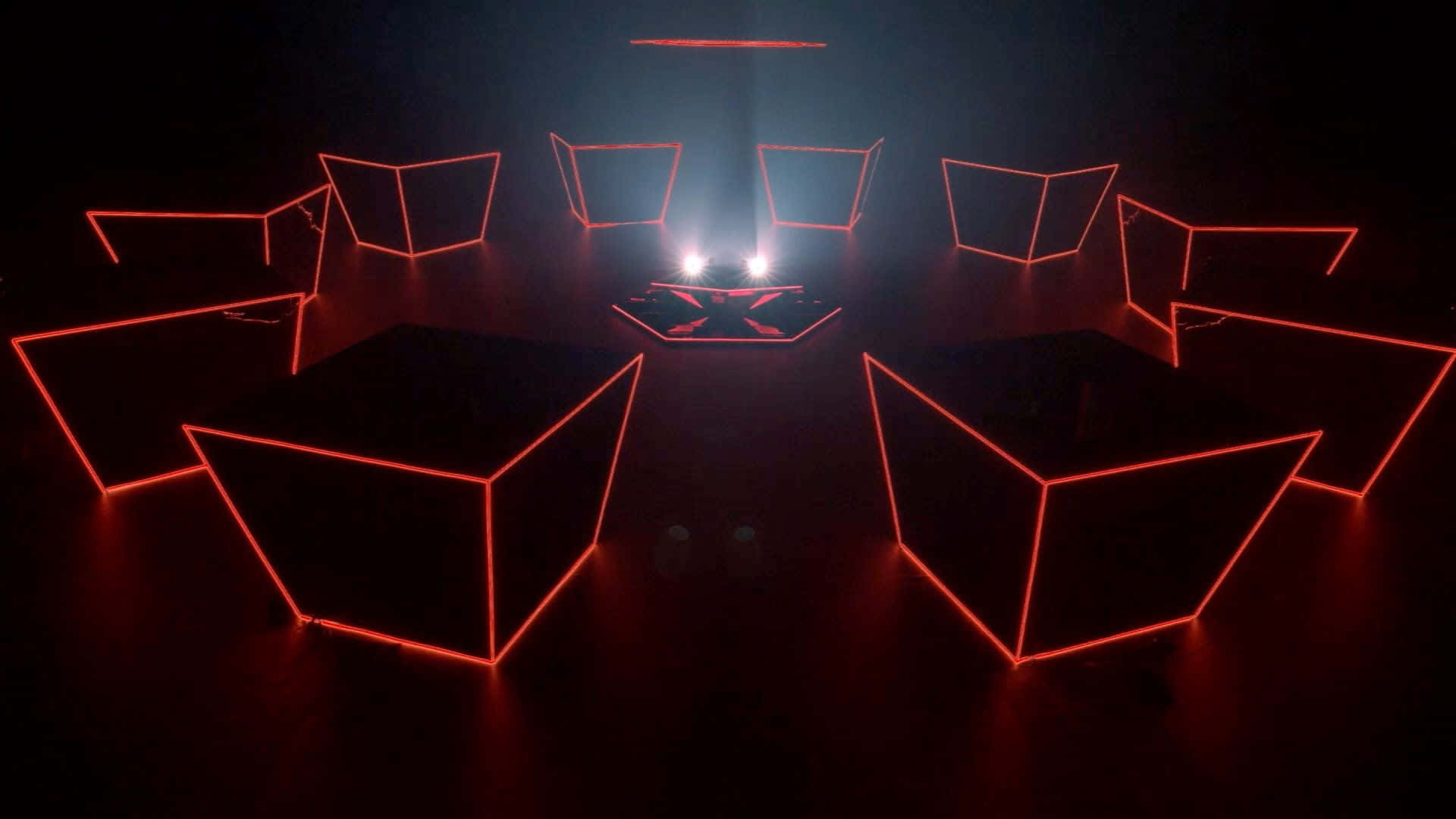 Ungrupo De Cubos Rojos En Una Habitación Oscura Fondo de pantalla