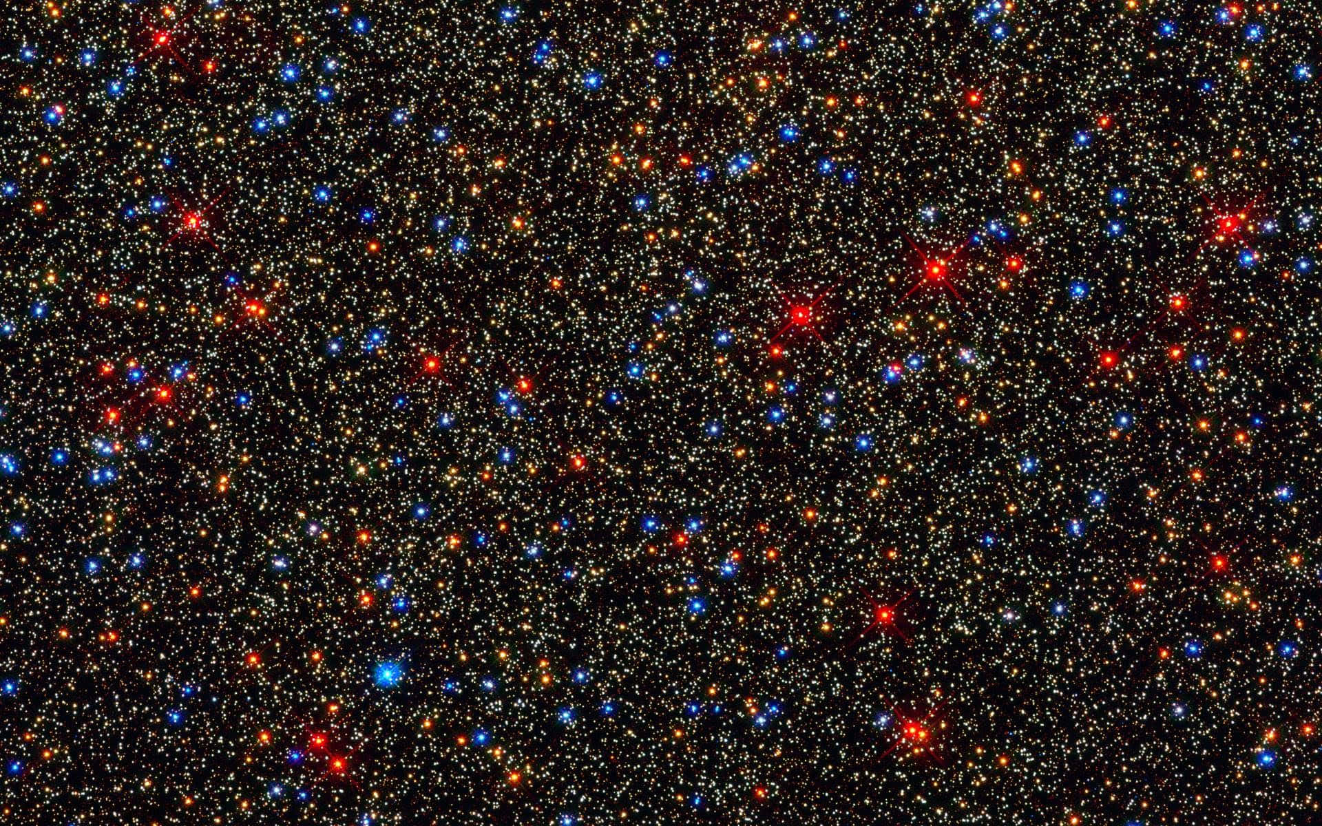 A Cluster Of Stars With Many Bright Stars Wallpaper