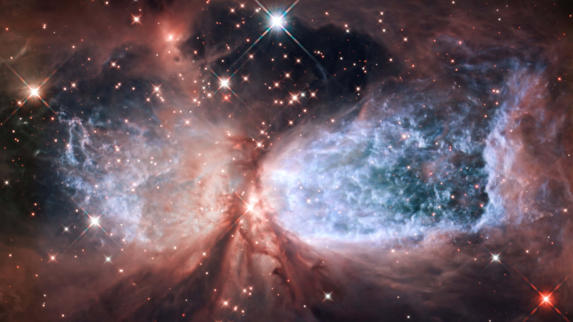 Glowing Nebula Captured By Hubble Telescope Wallpaper