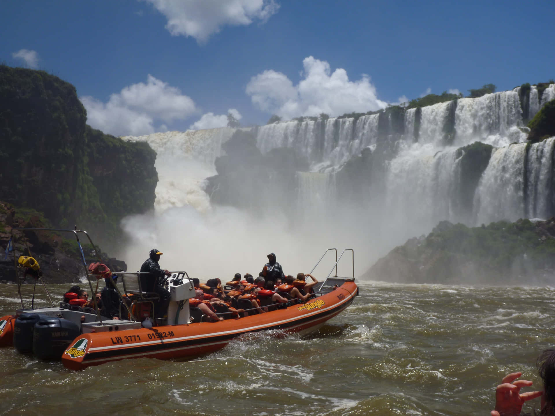Huge Waterfalls Boat Wallpaper