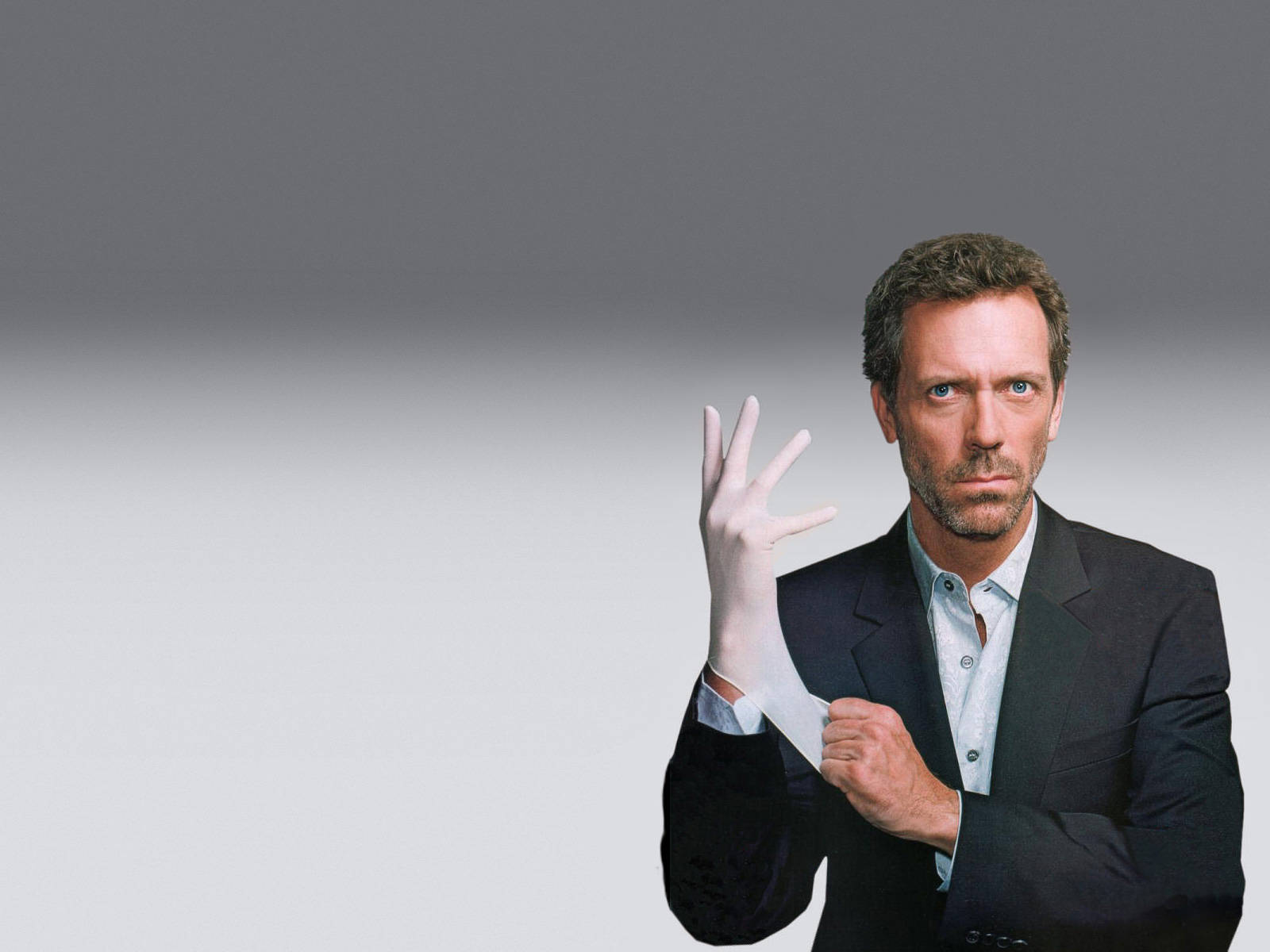 Hugh Laurie With Surgical Gloves Wallpaper
