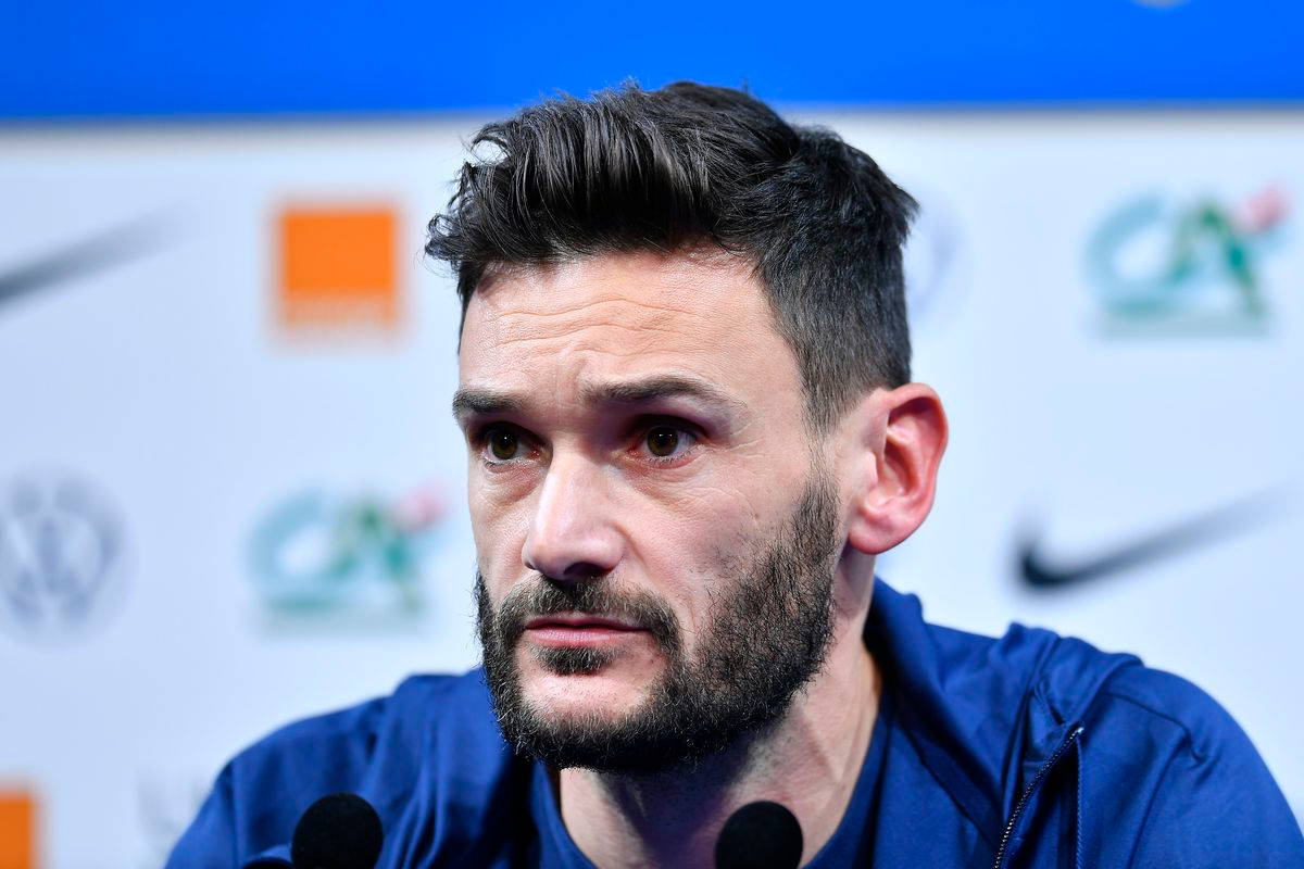 Caption: Hugo Lloris Engaged in an Interview Wallpaper