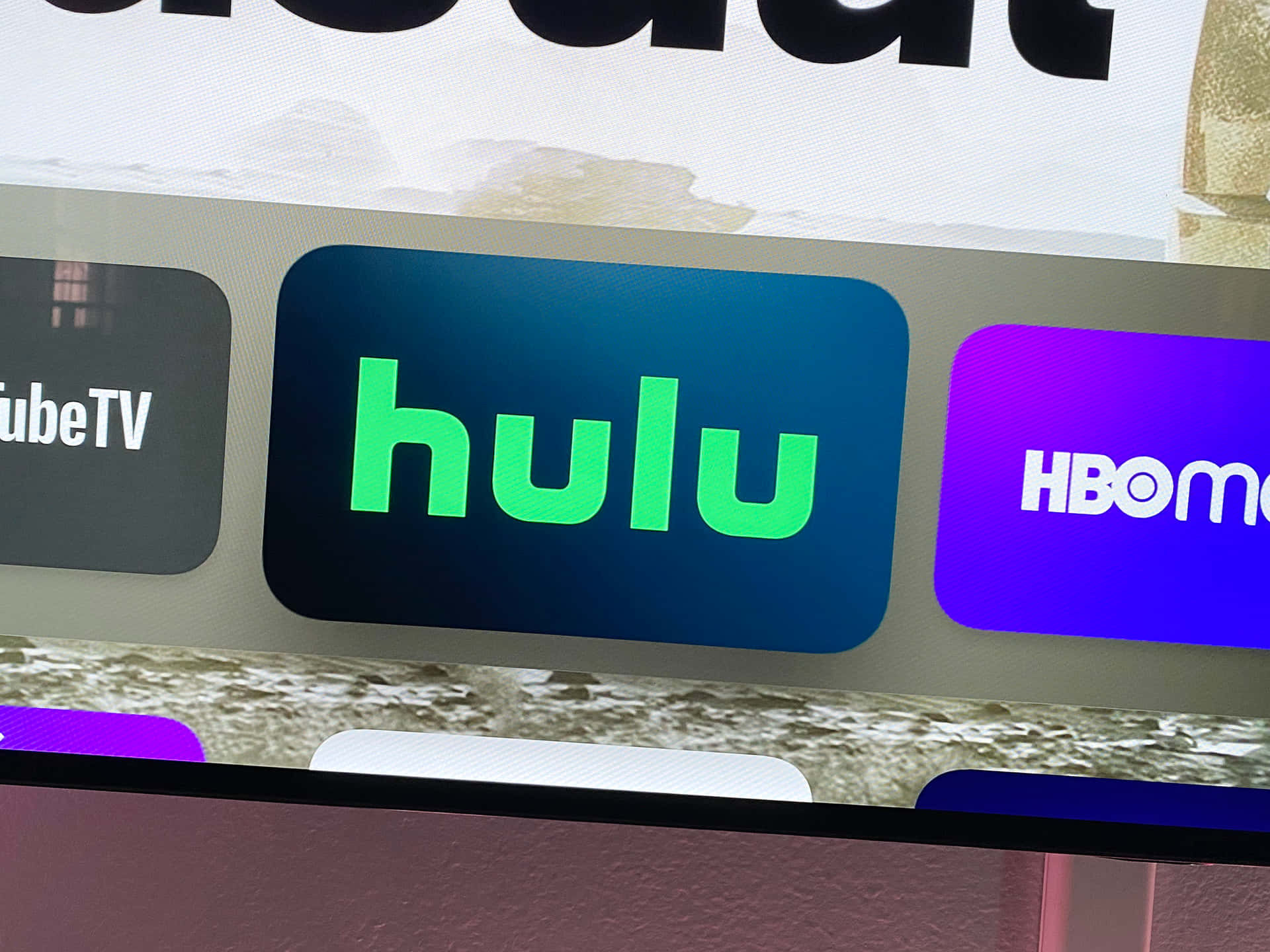A Tv Screen With Hulu And Other Apps