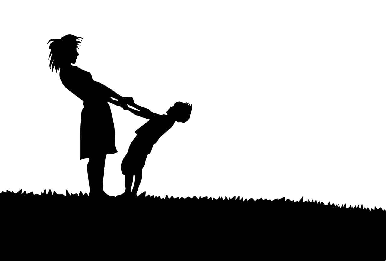 Humanitarian Worker And A Child Wallpaper