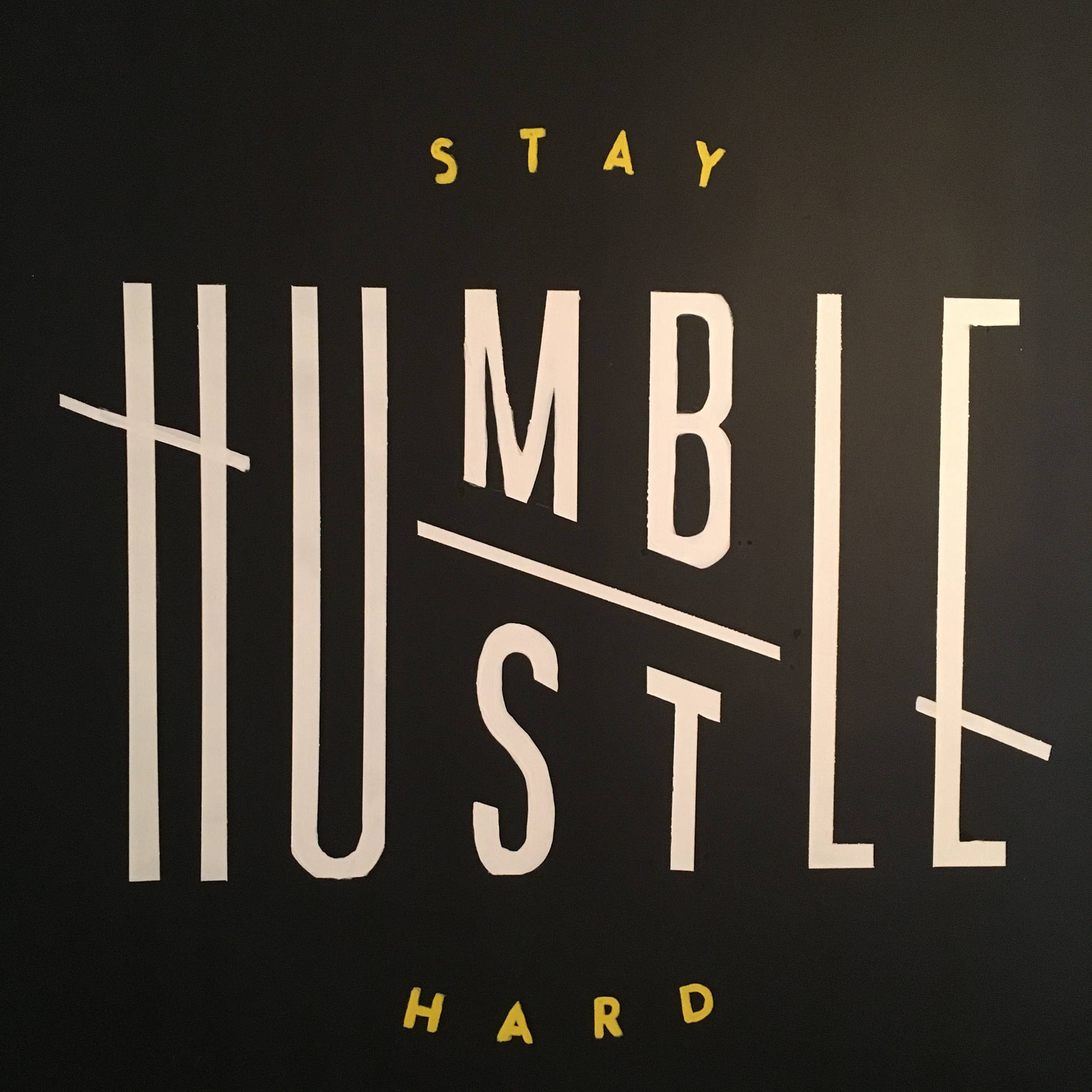 The Humble Hustle - a dynamic cityscape symbolizing ambitious determination. Wallpaper