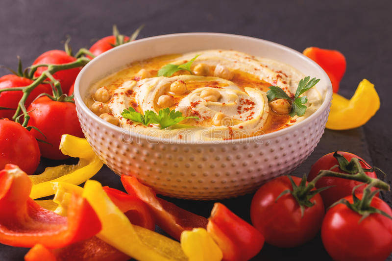 Vibrant Hummus Dish with Fresh Garnish and Vegetable Crudities Wallpaper