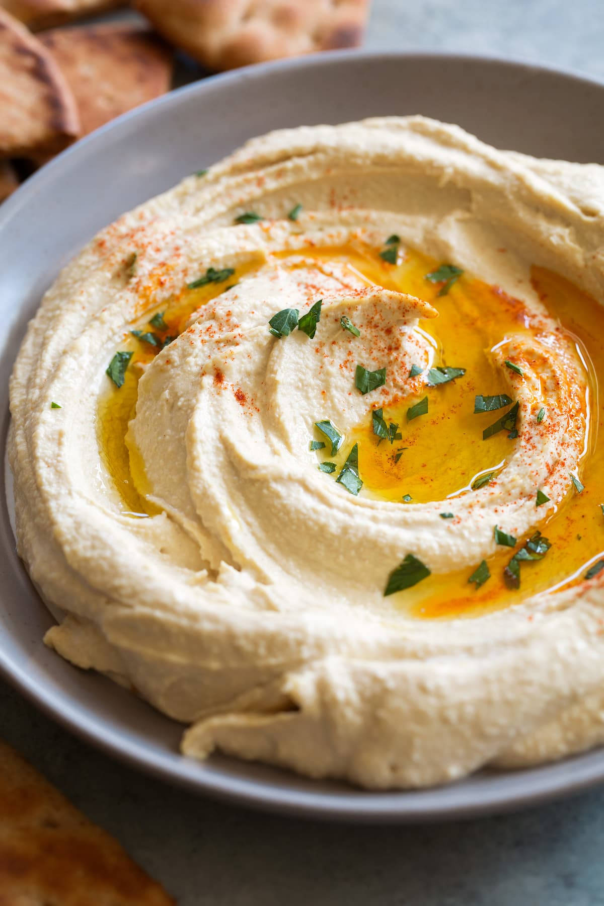 A Delicious Bowl of Creamy Hummus Drizzled with Olive Oil Wallpaper