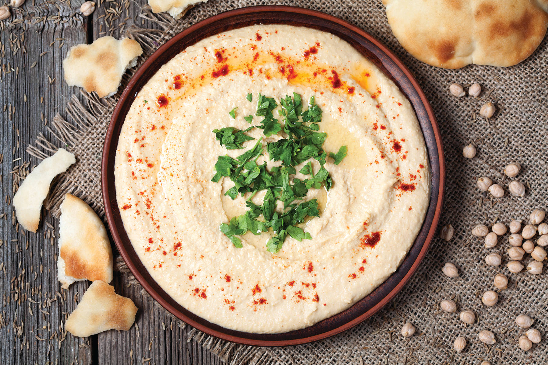 Hummus With Table Mat On Wood Wallpaper