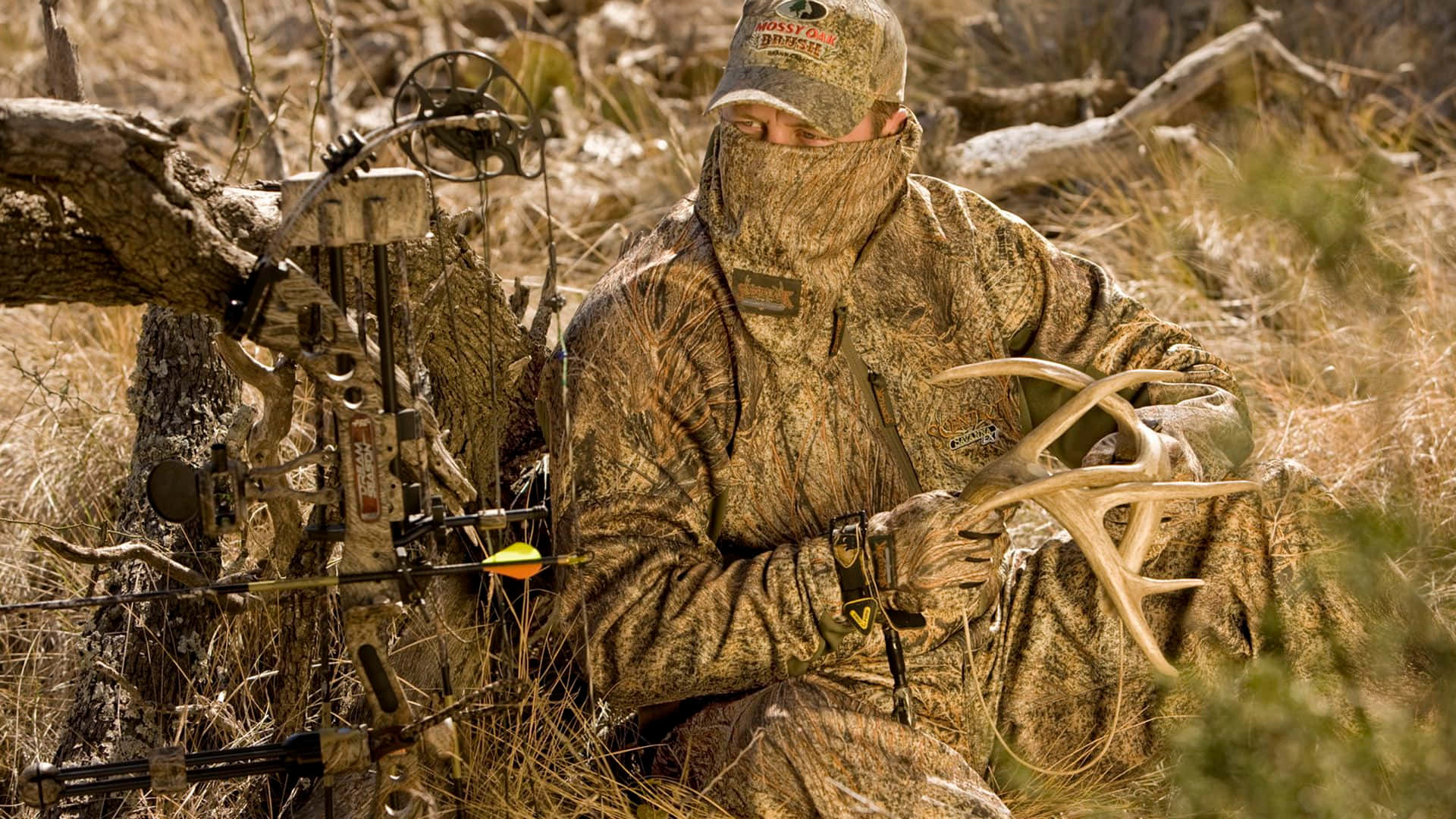 Blend in with nature in stylish camouflage hunting gear. Wallpaper