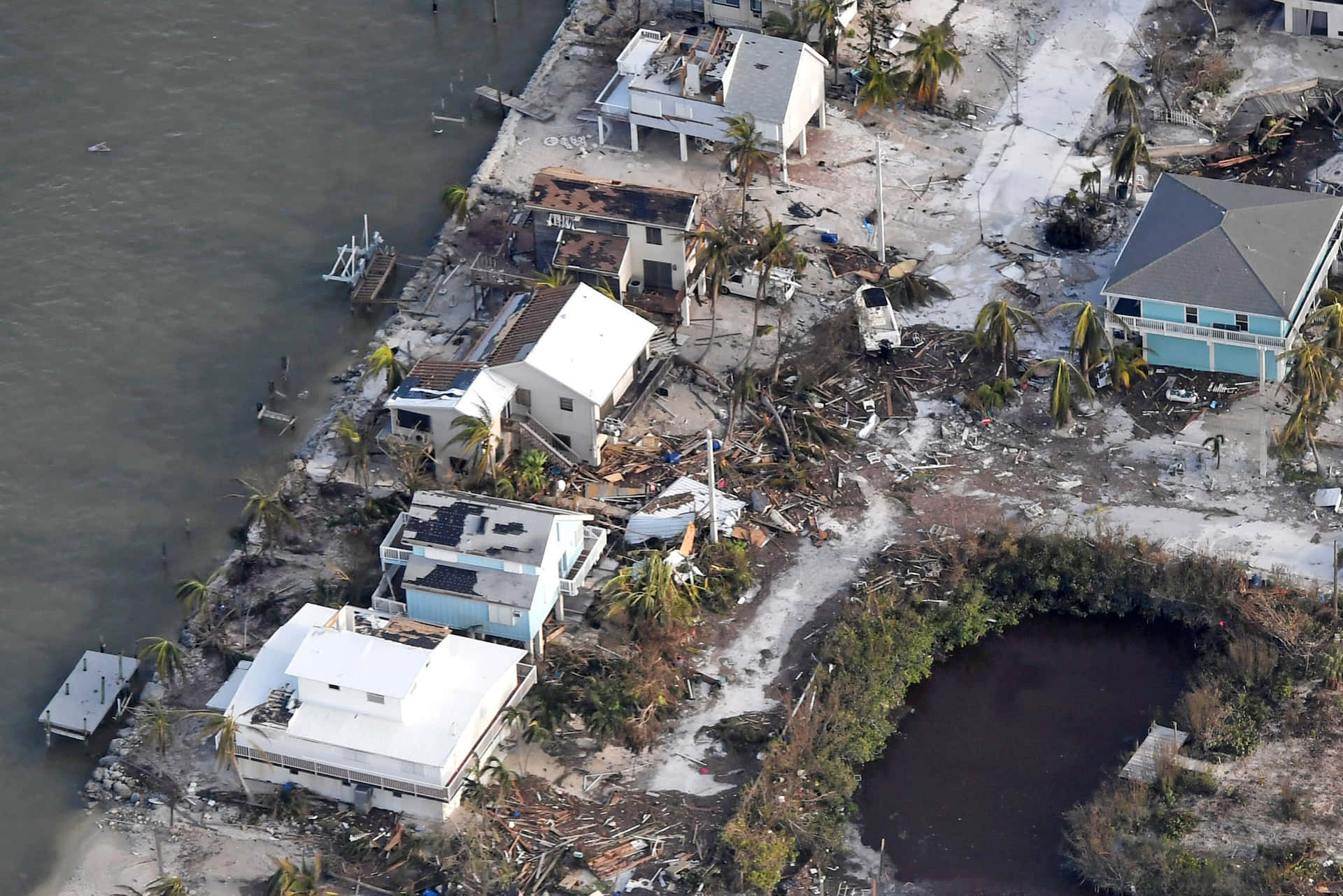Powerful Hurricane Winds Send Debris Flying