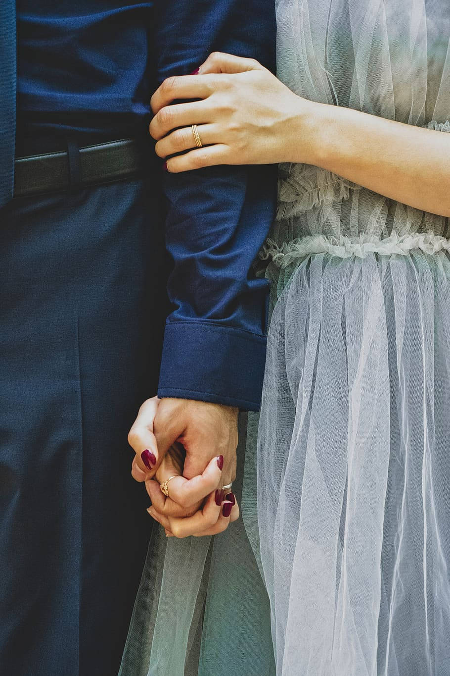 Husband And Wife Holding Hands Wallpaper