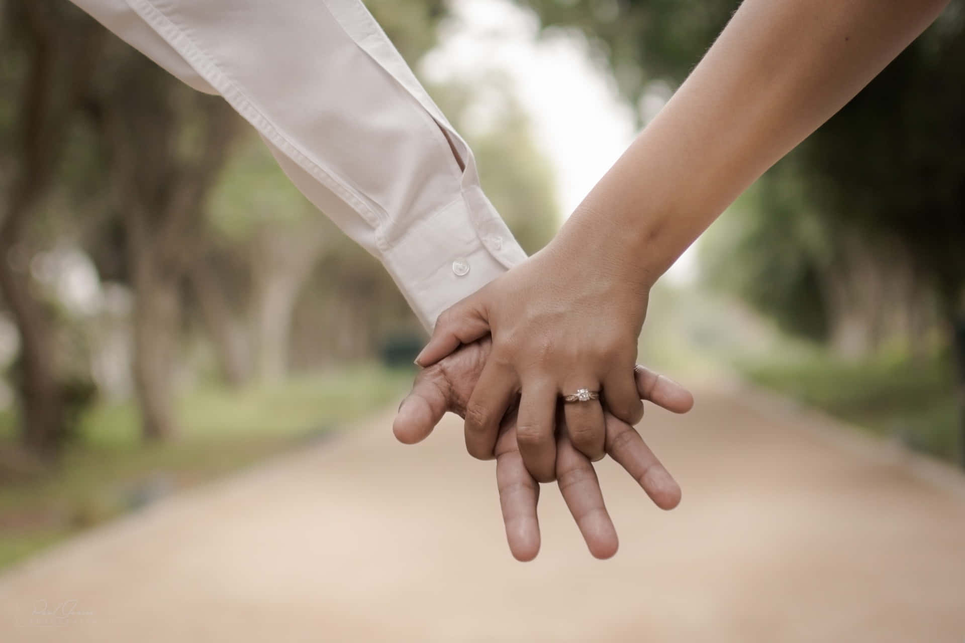 Husband And Wife Married Holding Hands Wallpaper