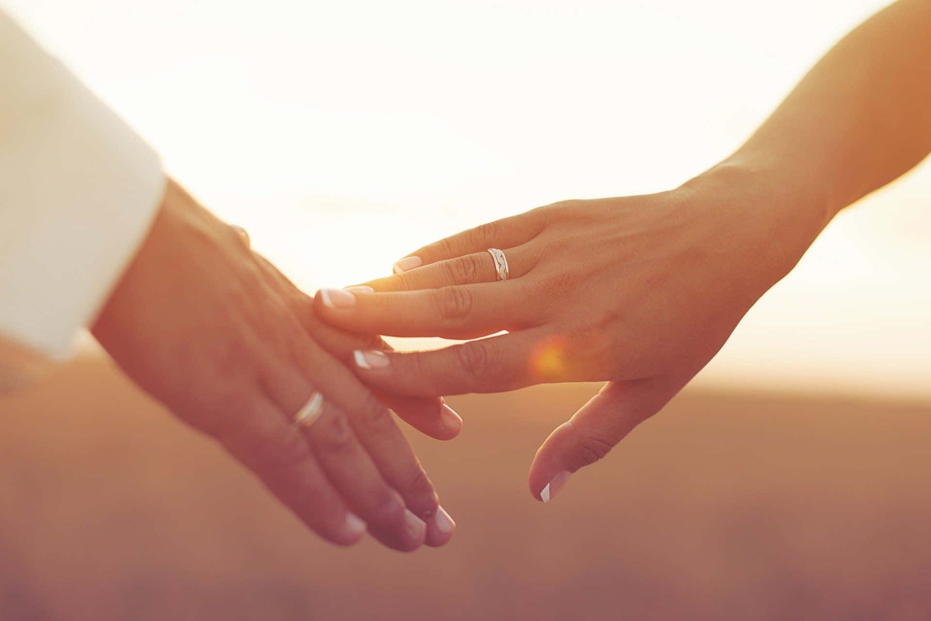 Download Husband And Wife Wedding Rings Sunset Wallpaper 
