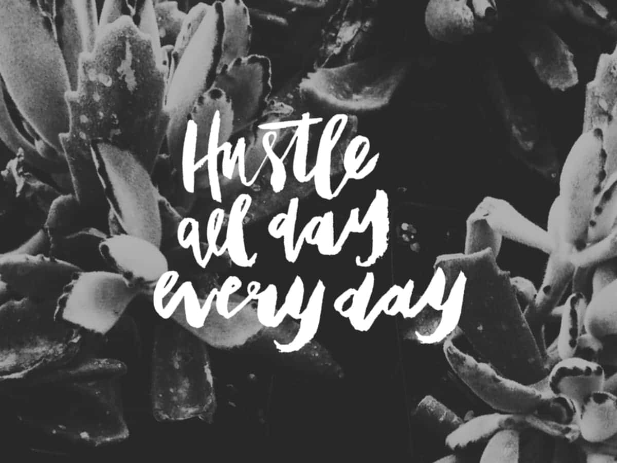 A Black And White Photo Of A Plant With The Words Hustle All Day Every Day Wallpaper