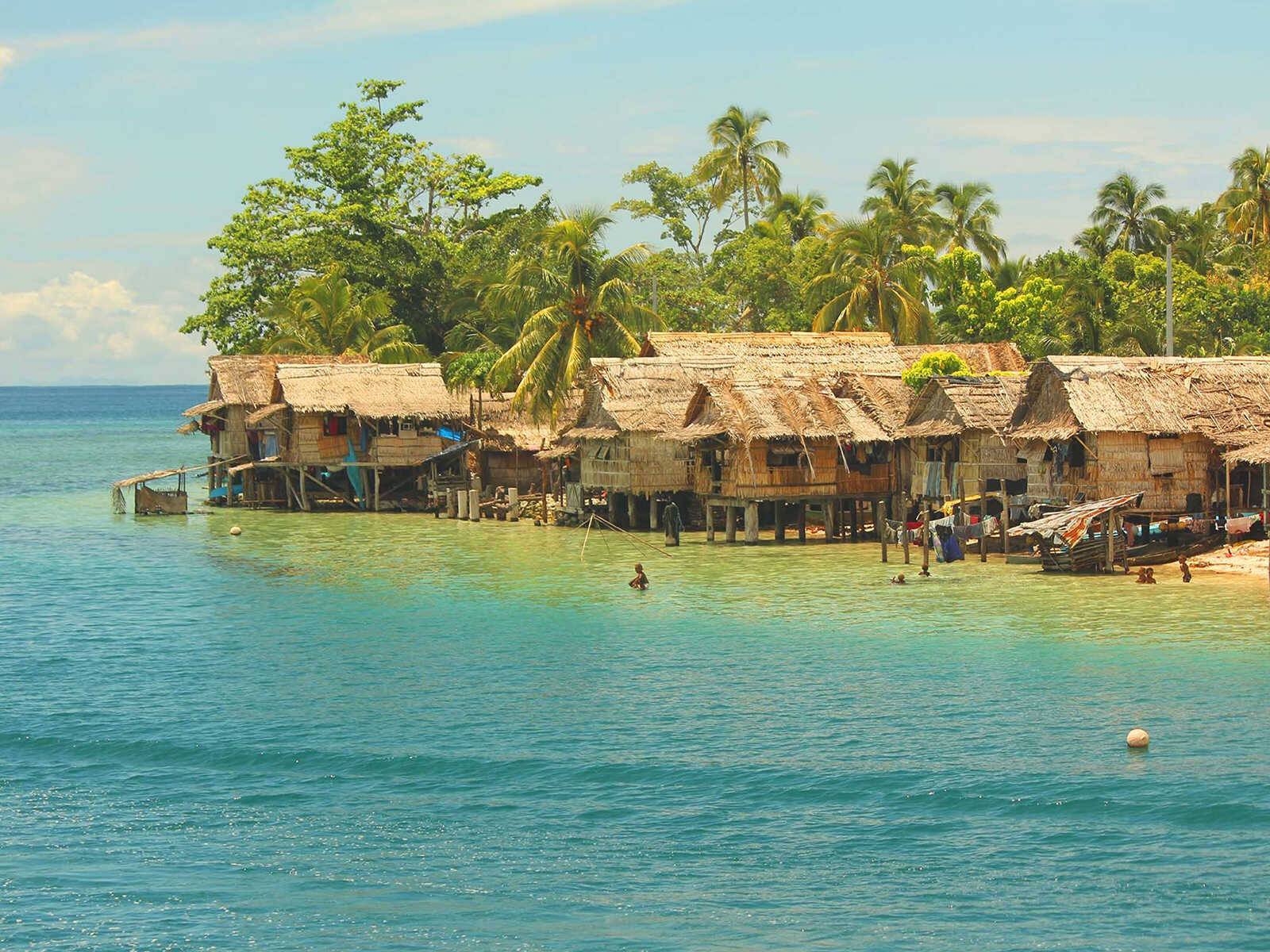 Huts By The Solomon Islands Sea Wallpaper