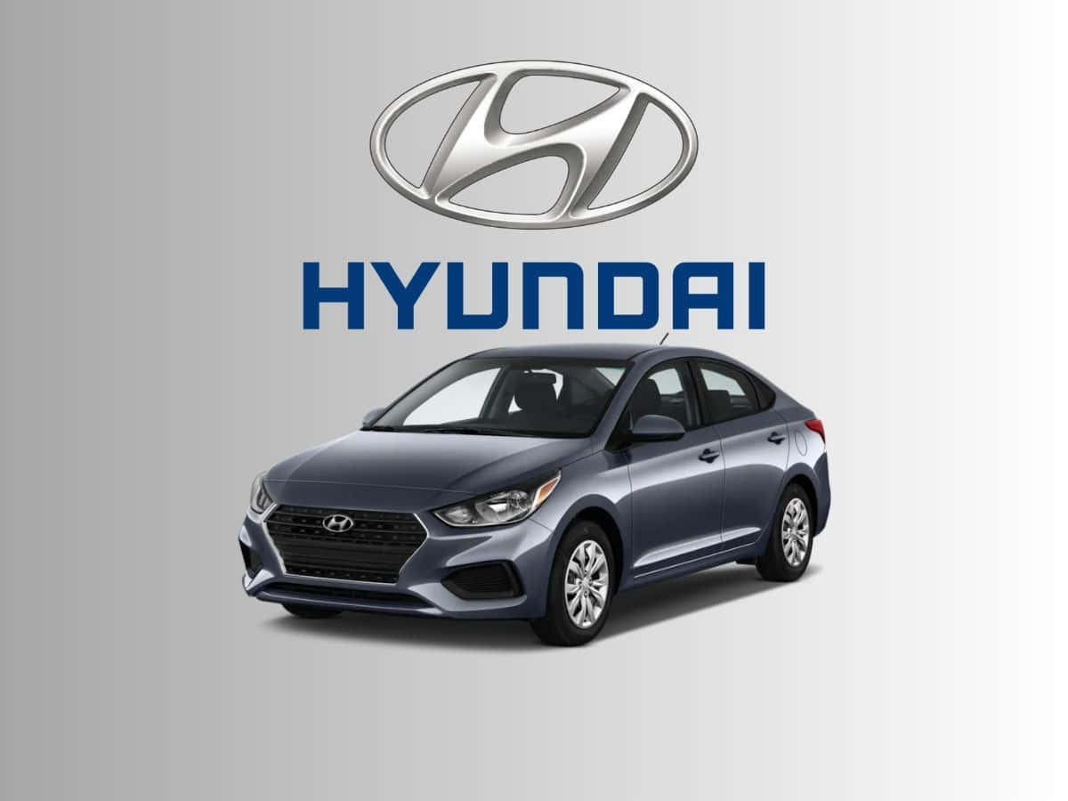 Sleek Hyundai Accent in a Picturesque Landscape Wallpaper