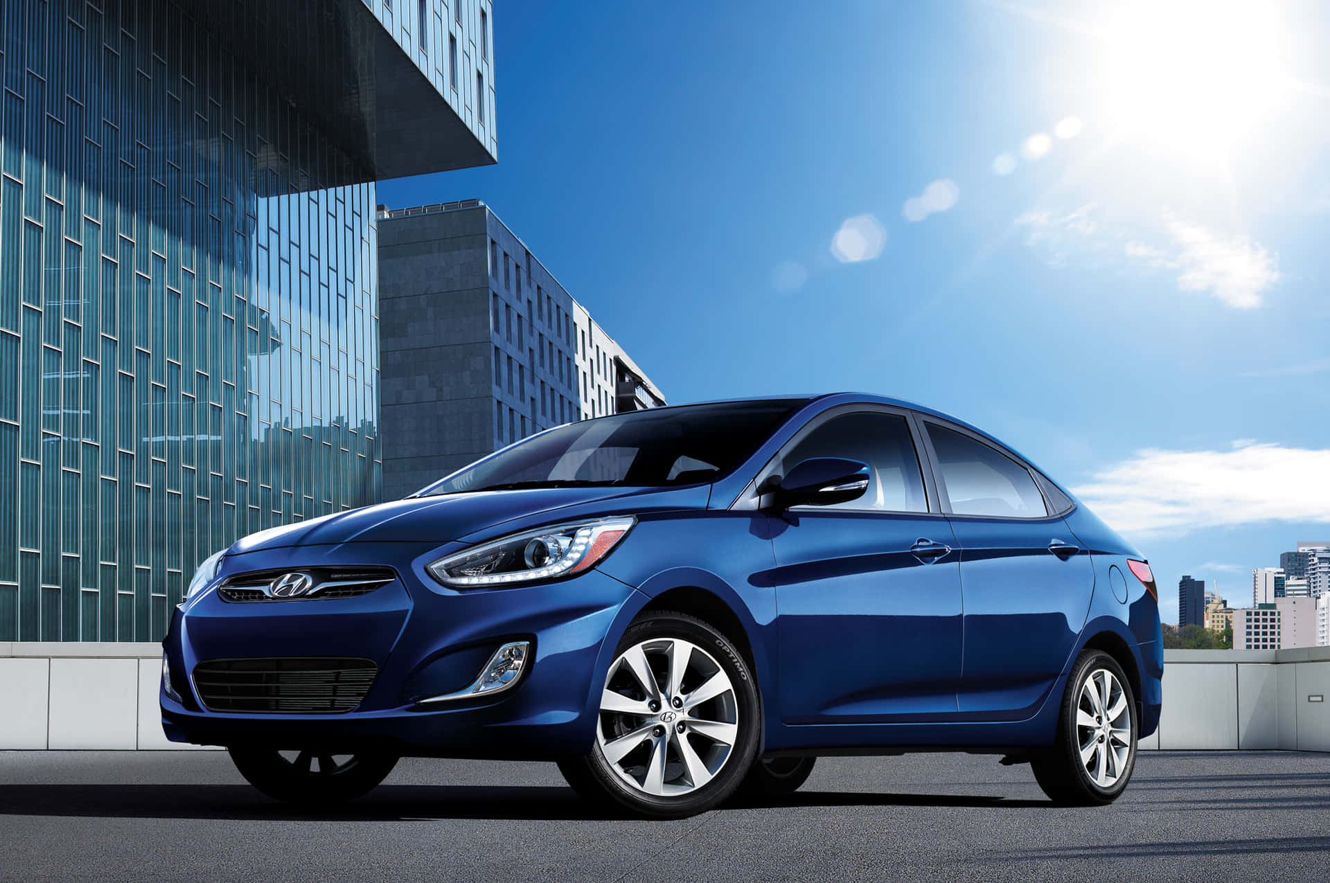 Caption: Sleek Hyundai Accent in Motion Wallpaper