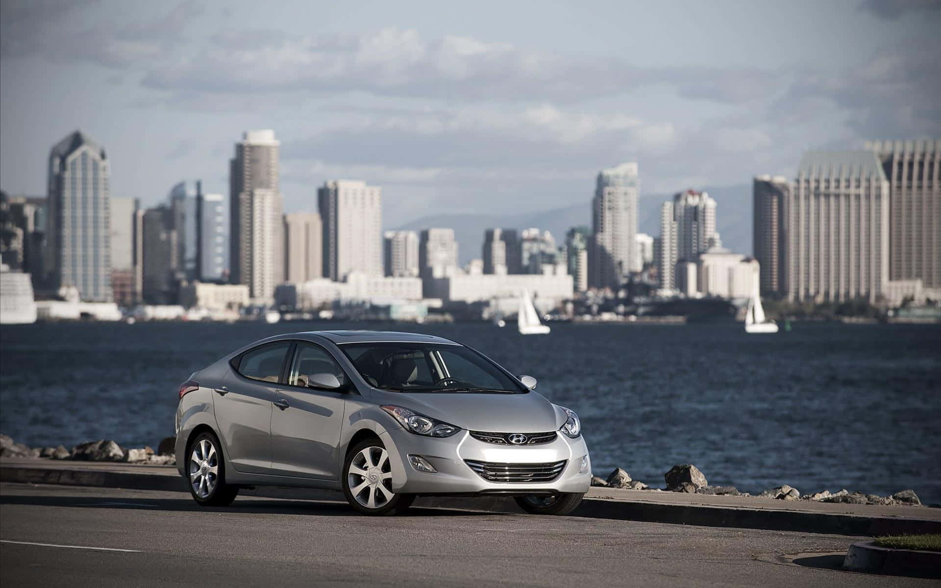 Caption: Sleek Hyundai Elantra in Action Wallpaper