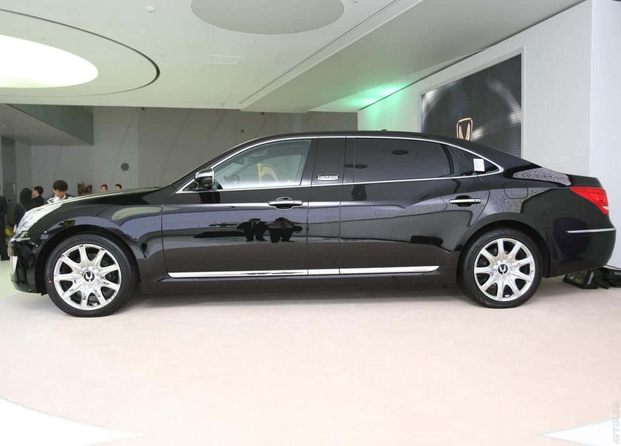 Sleek Hyundai Equus luxury sedan parked in elegance Wallpaper