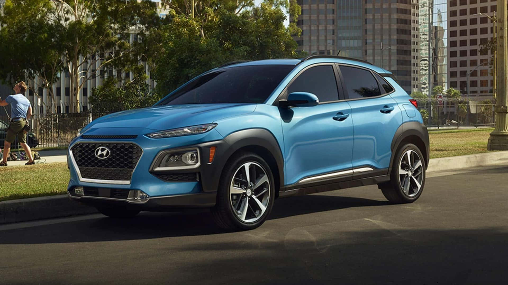 Sleek Hyundai Kona in Vibrant Urban Setting Wallpaper