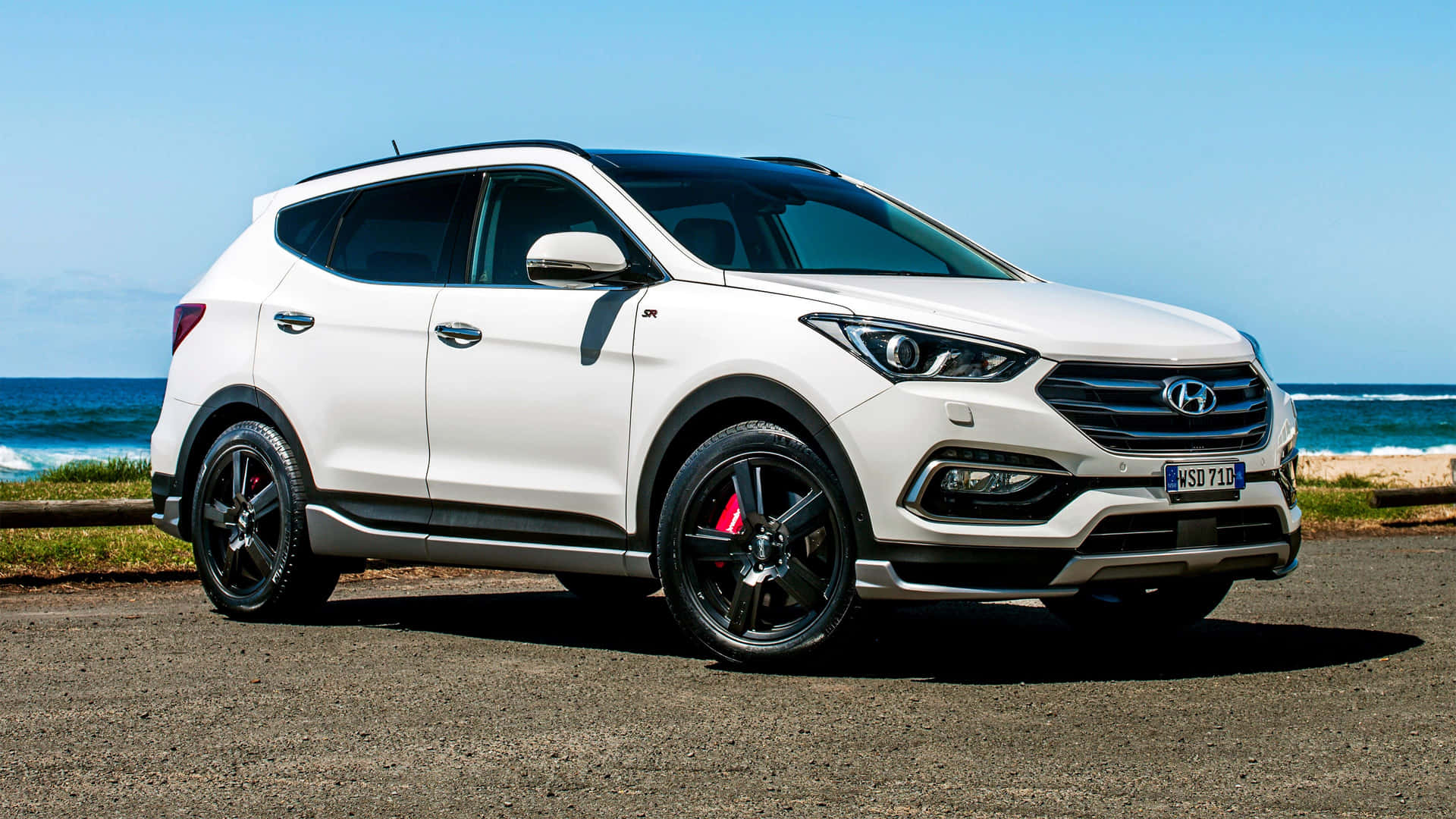 Sleek Hyundai Santa Fe on Scenic Landscape Wallpaper