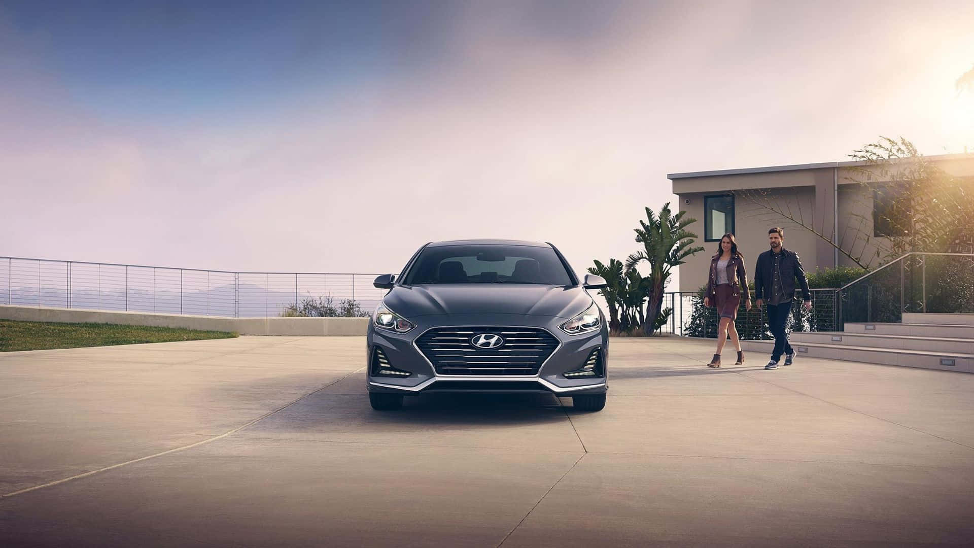 Sleek Hyundai Sonata on Open Road Wallpaper