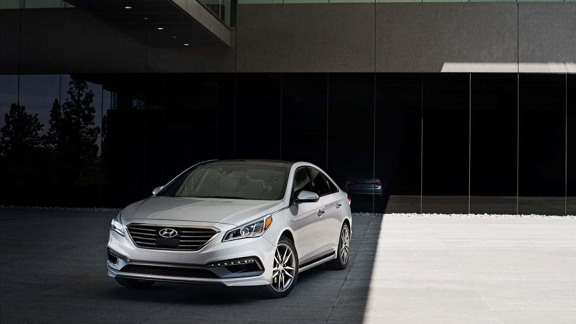 Sleek Hyundai Sonata on Scenic Roadside Wallpaper