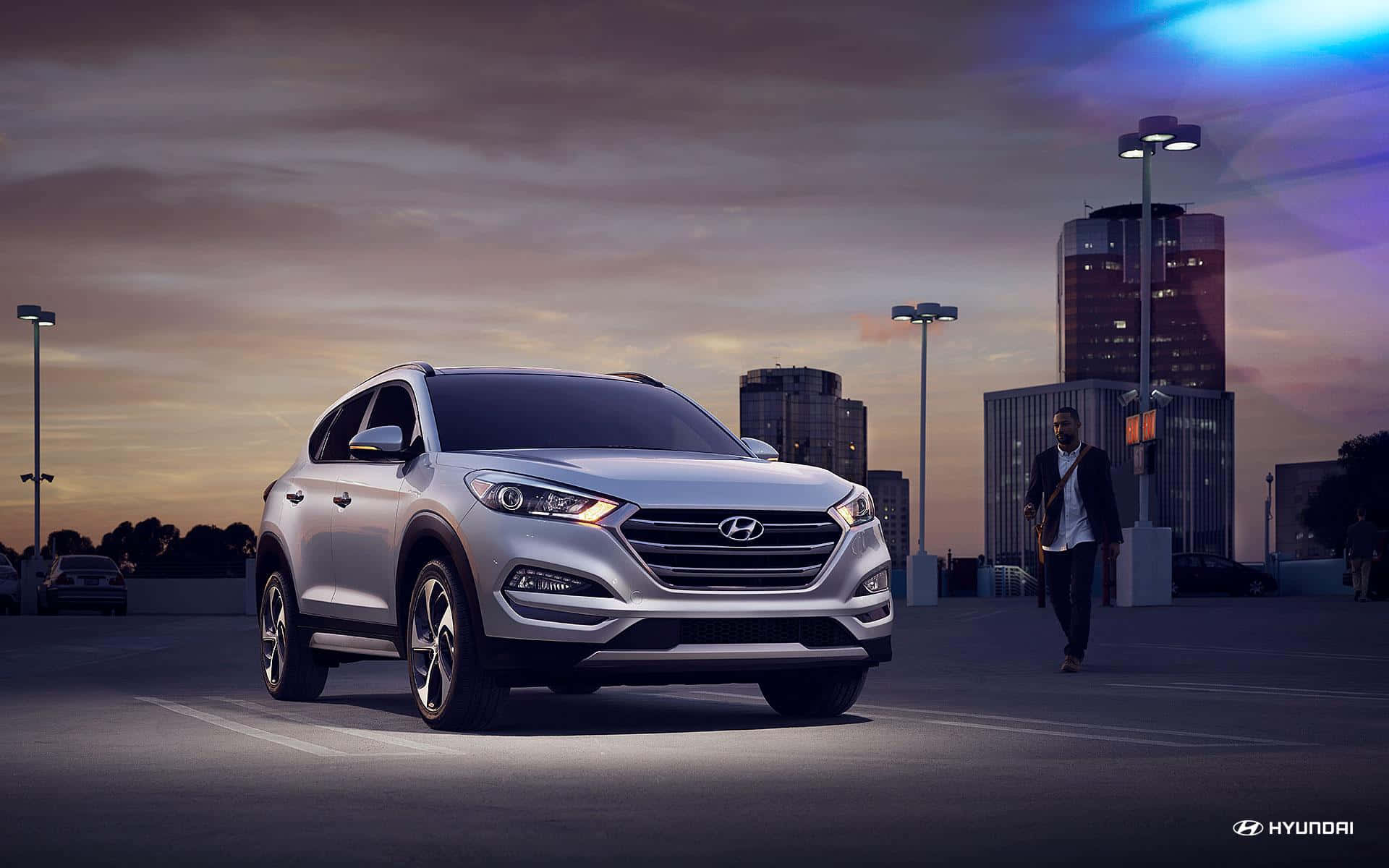 Sleek Hyundai Tucson on the Road Wallpaper