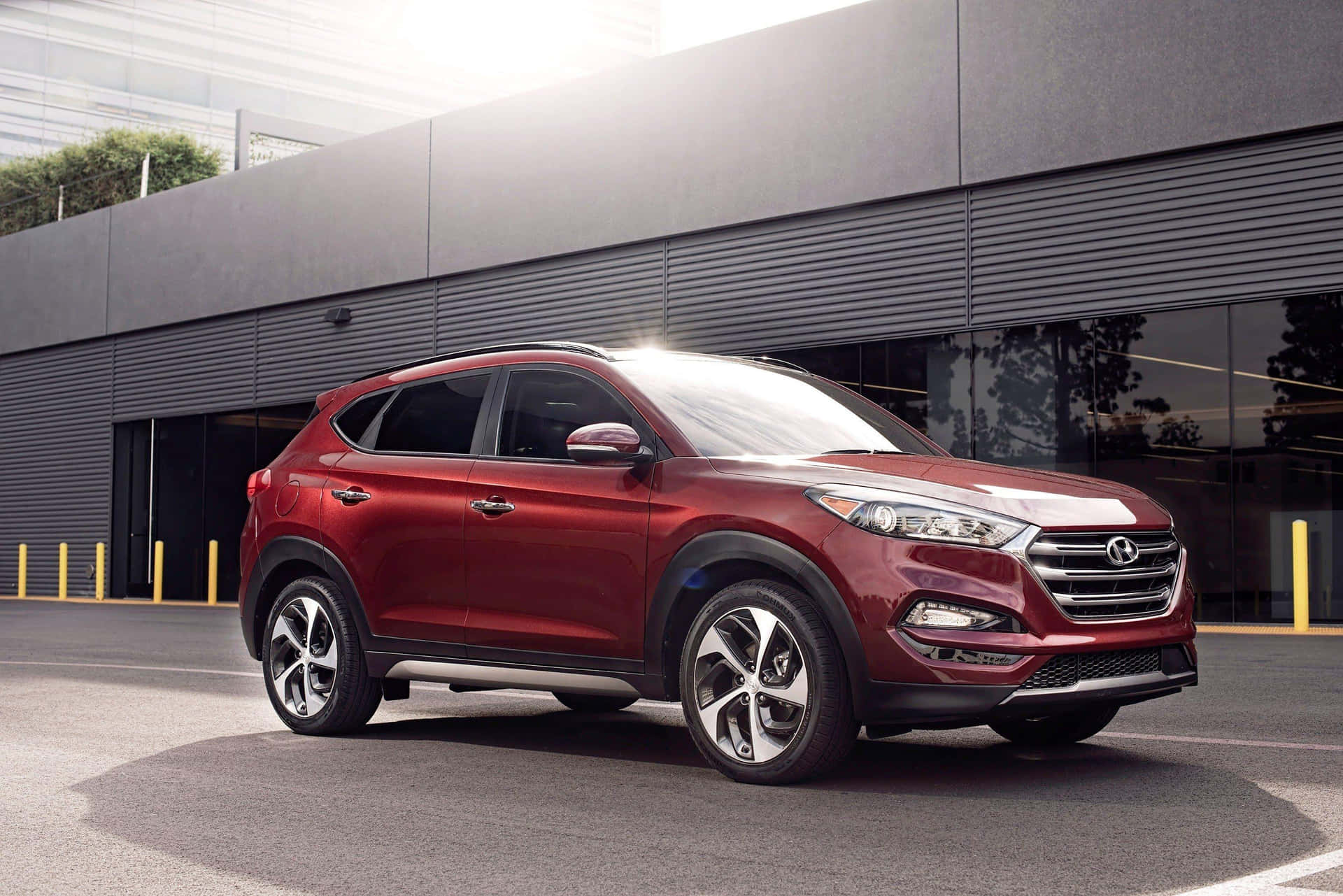 Stylish Hyundai Tucson on a scenic drive Wallpaper