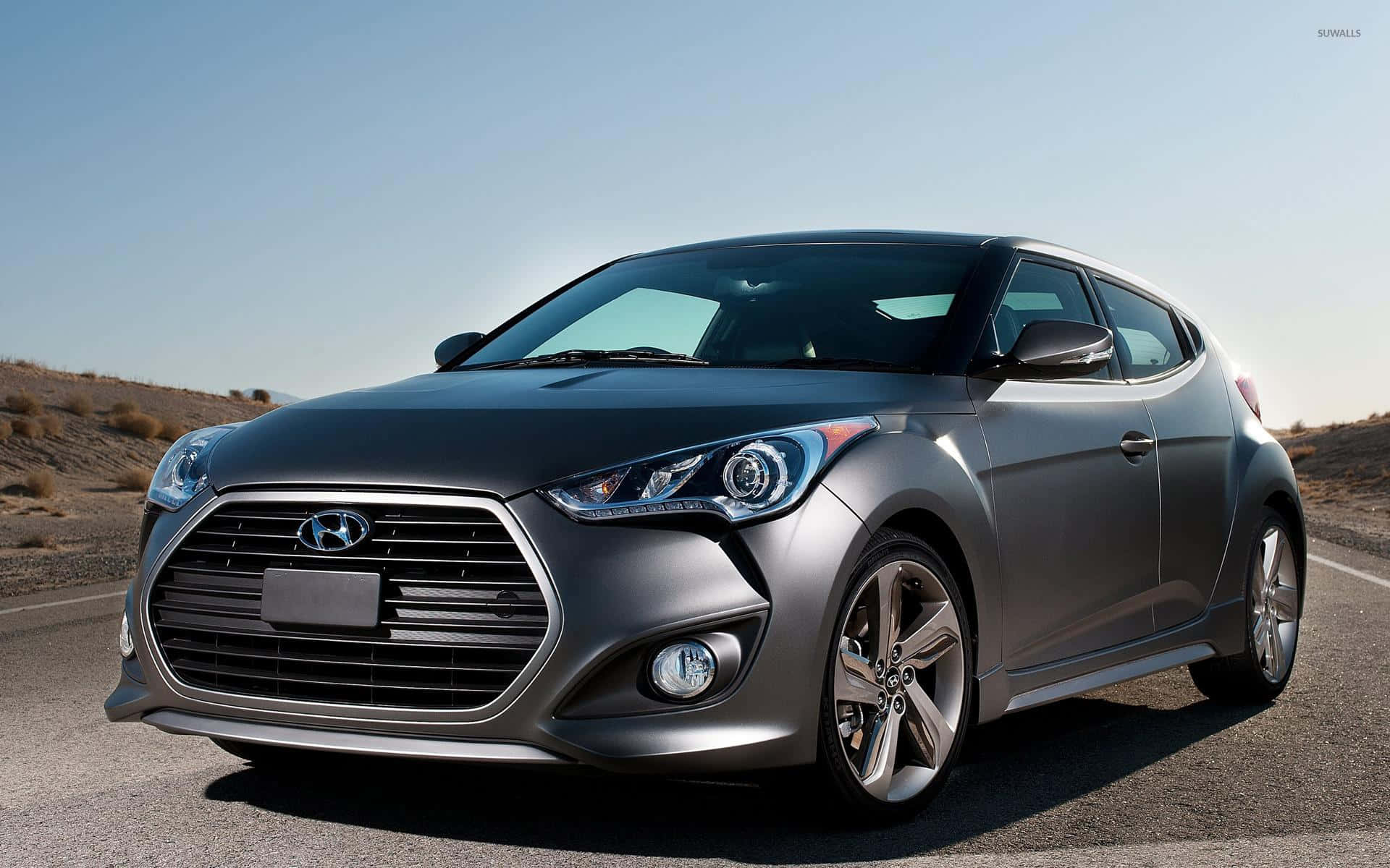 Stunning Hyundai Veloster in motion on the open road Wallpaper