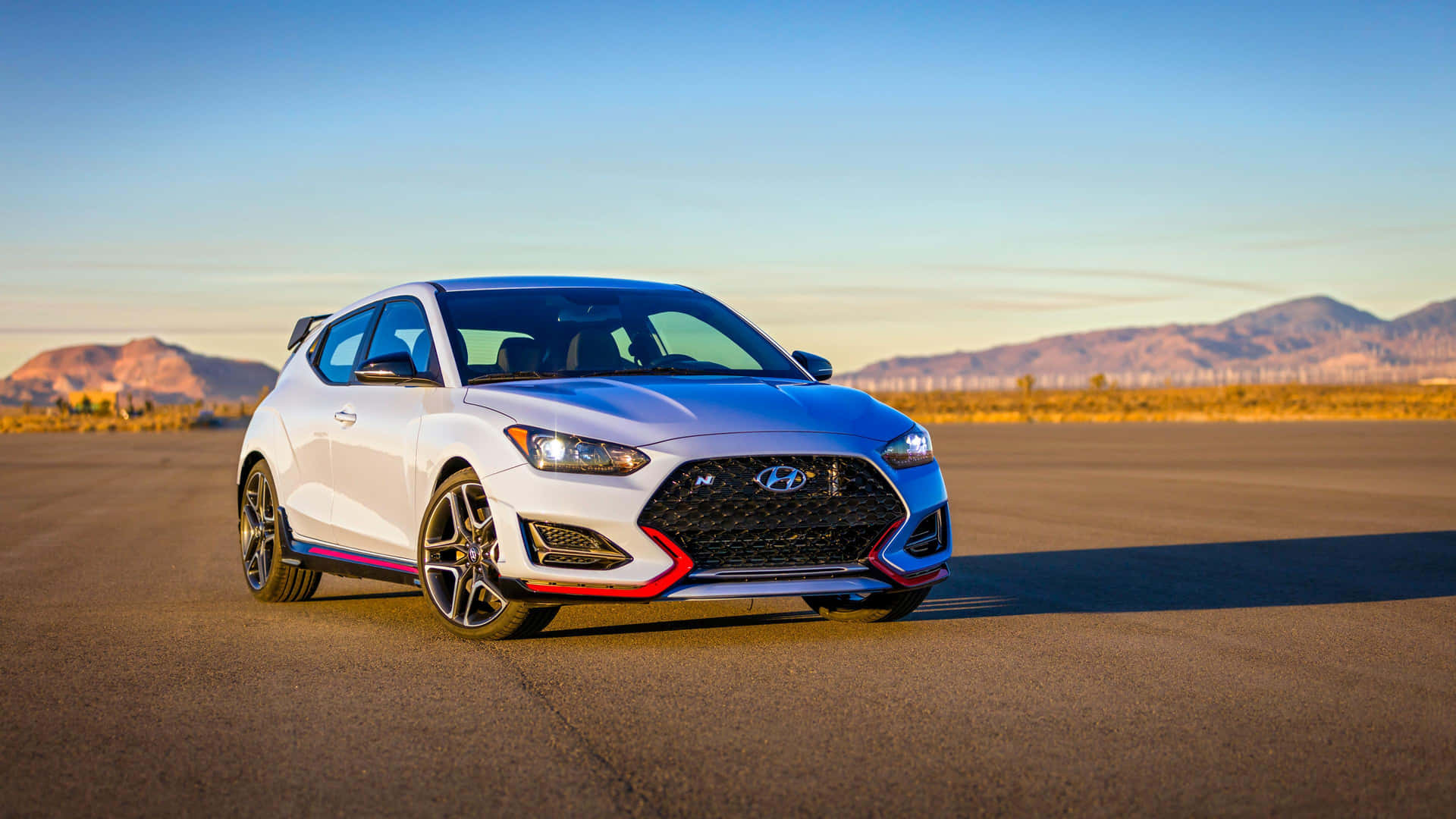 Sleek Hyundai Veloster on Urban Street Wallpaper