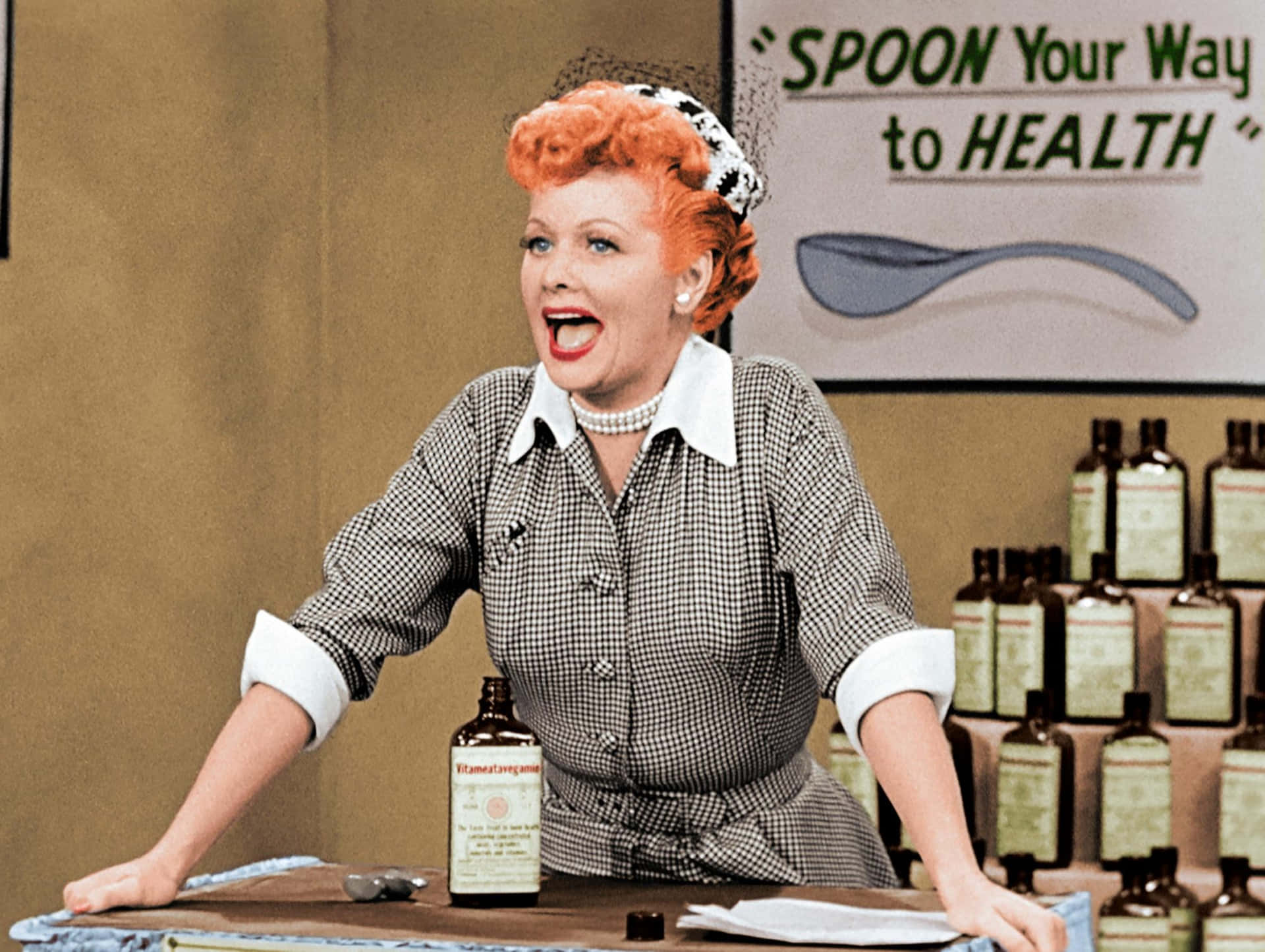 A Woman Is Standing In Front Of A Counter With Bottles Of Medicine Wallpaper