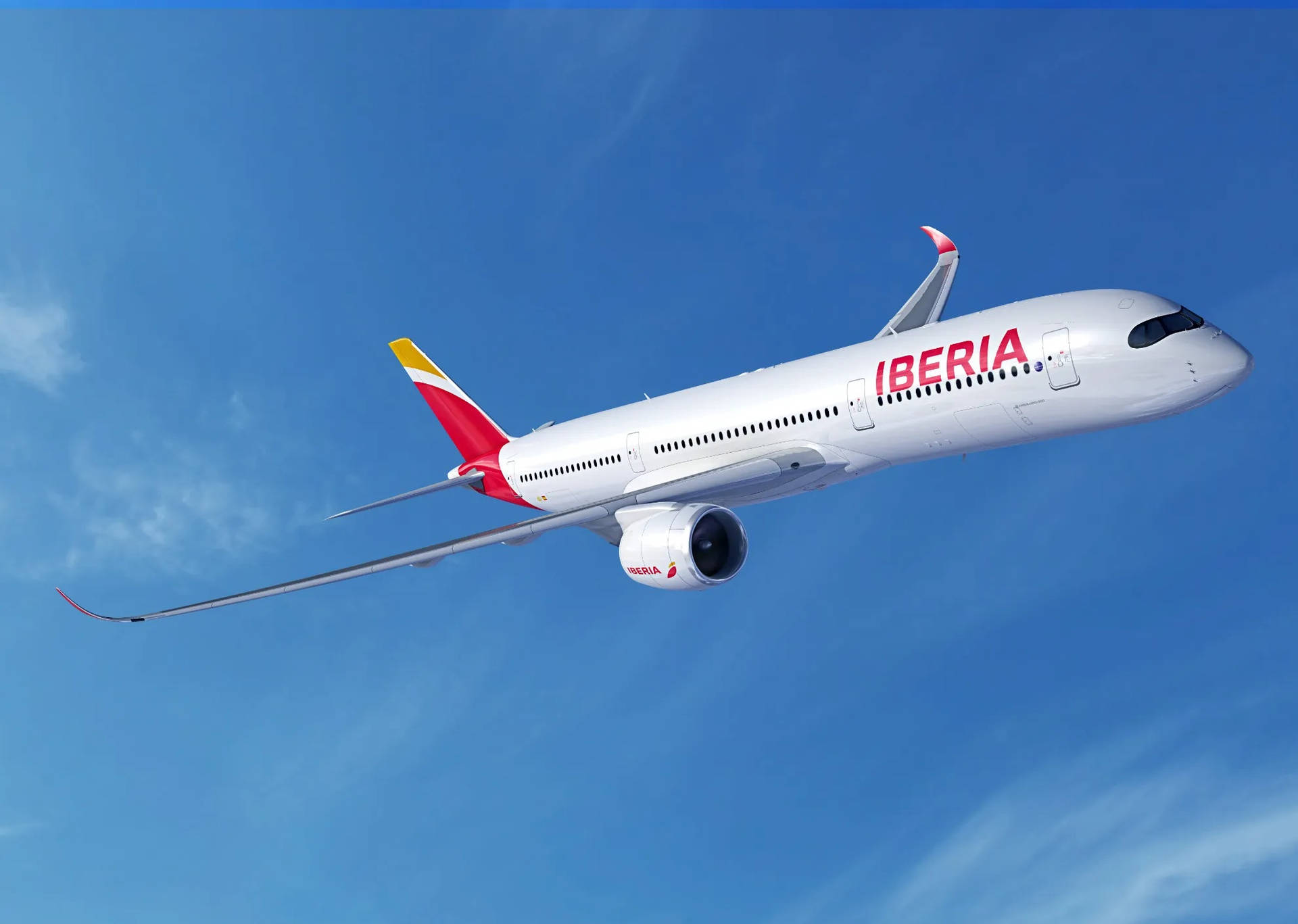 Et fly fra Iberia Airlines, der flyver sidelæns. Wallpaper
