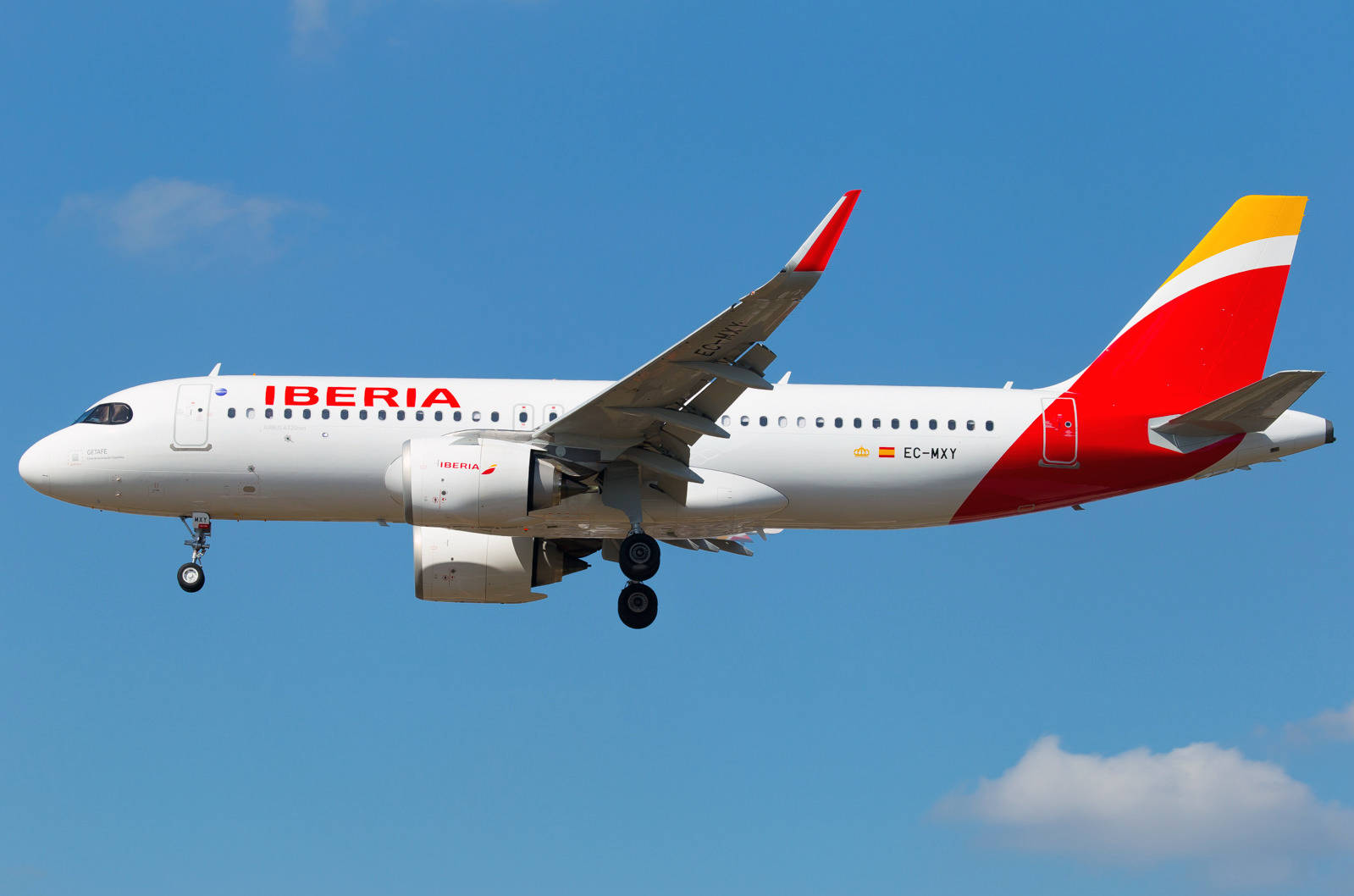 Iberia Airlines Airplane in Steady Flight. Wallpaper