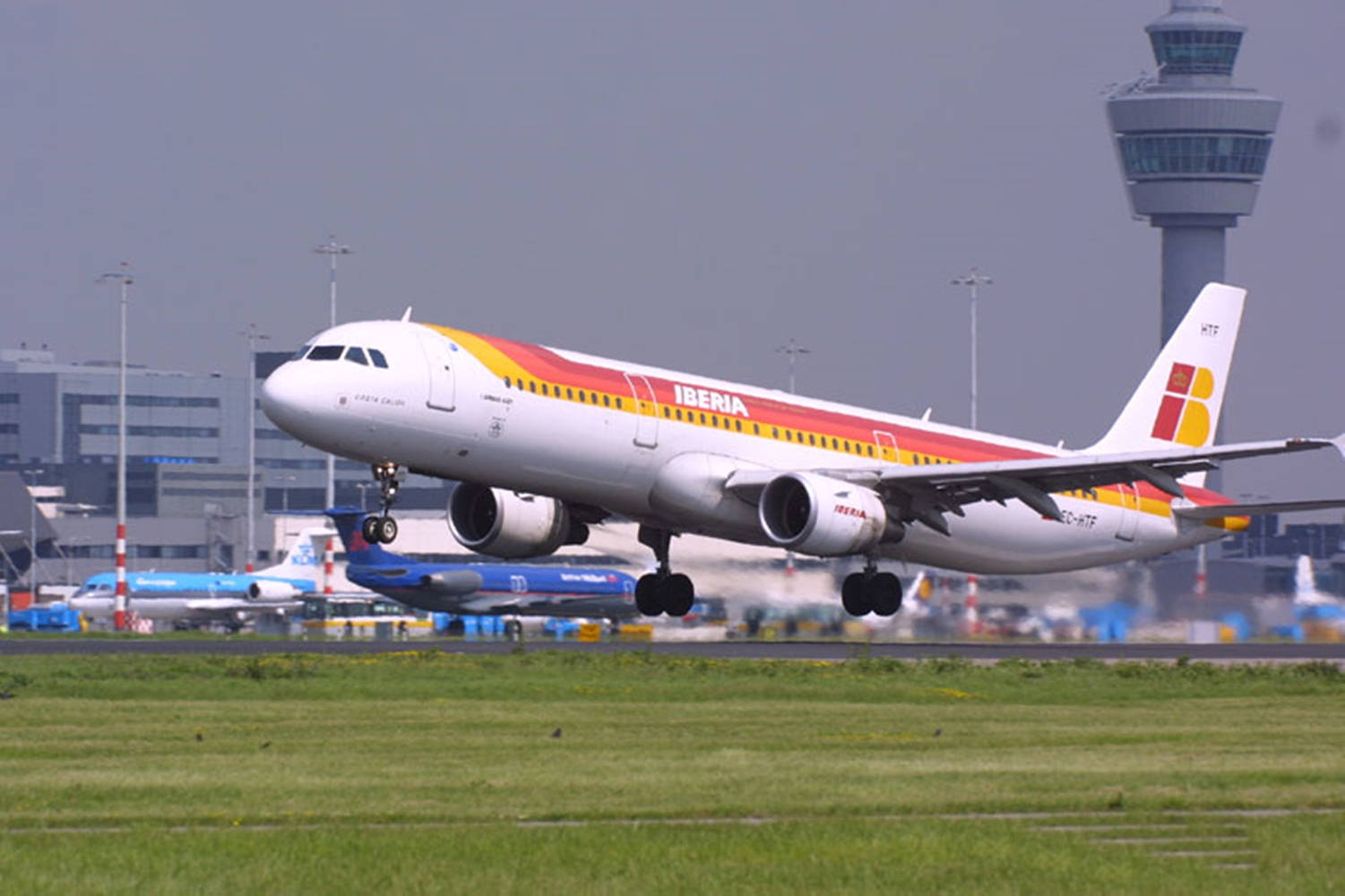 Iberia Airlines Airplane Takeoff On Busy Airport Wallpaper