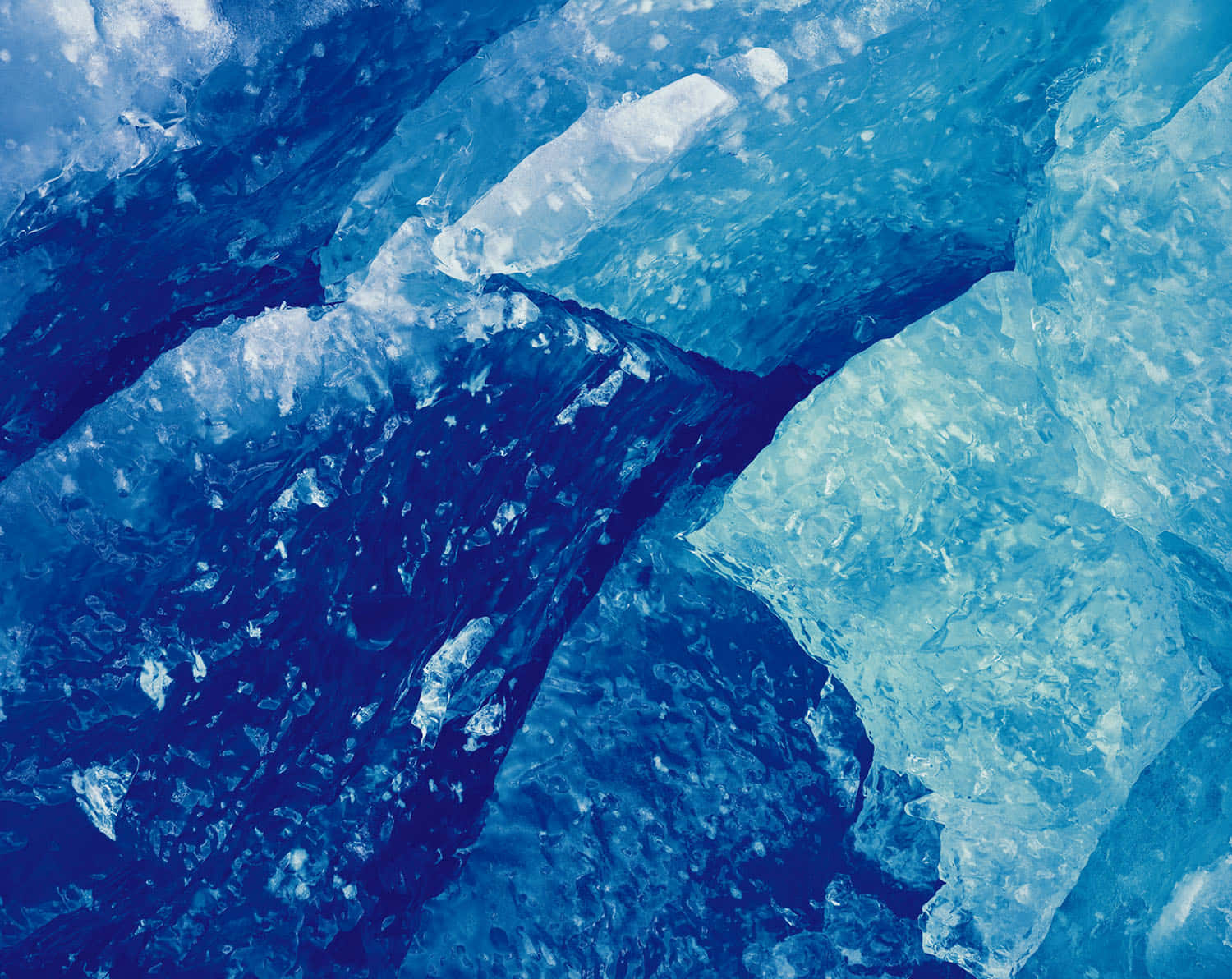 Ethereal beauty of an ice blue winter wonderland. Wallpaper