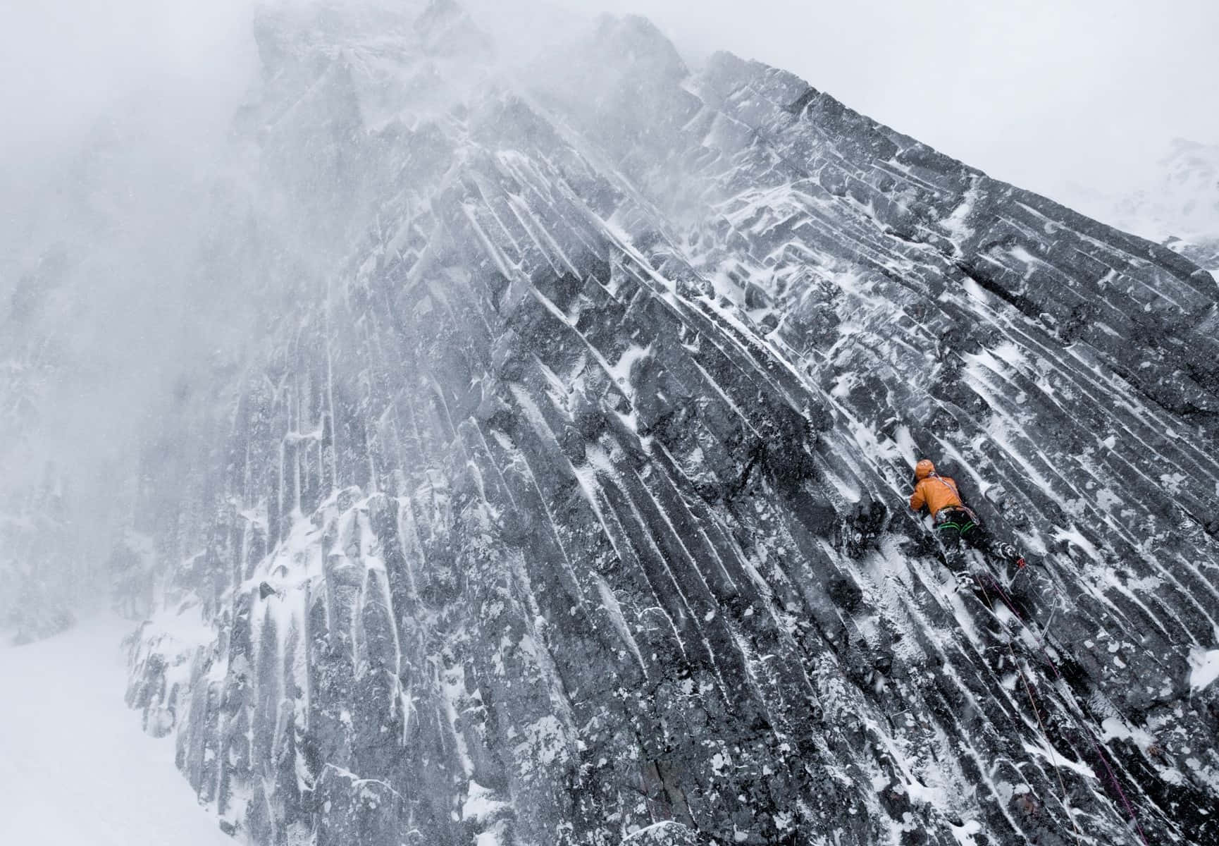 Thrilling Ice Climbing Adventure Wallpaper