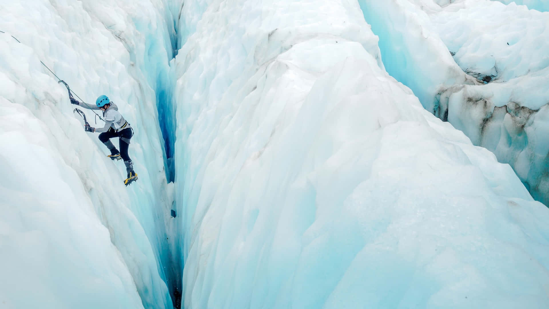 Captivating Ice Climbing Adventure Wallpaper