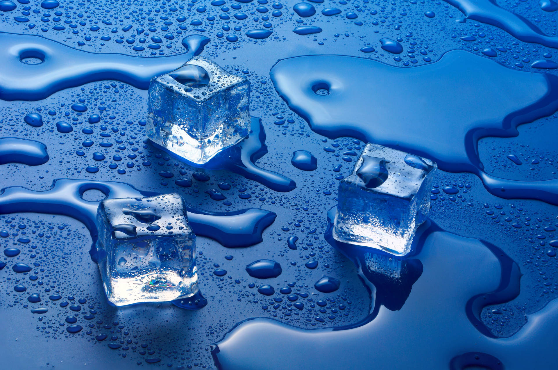 Caption: A Solitary Ice Cube Melting Wallpaper