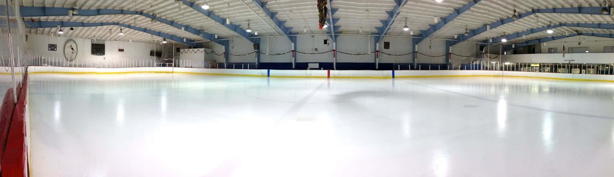 Gliding at Twilight: Ice Skating under a Mesmerizing Sky Wallpaper