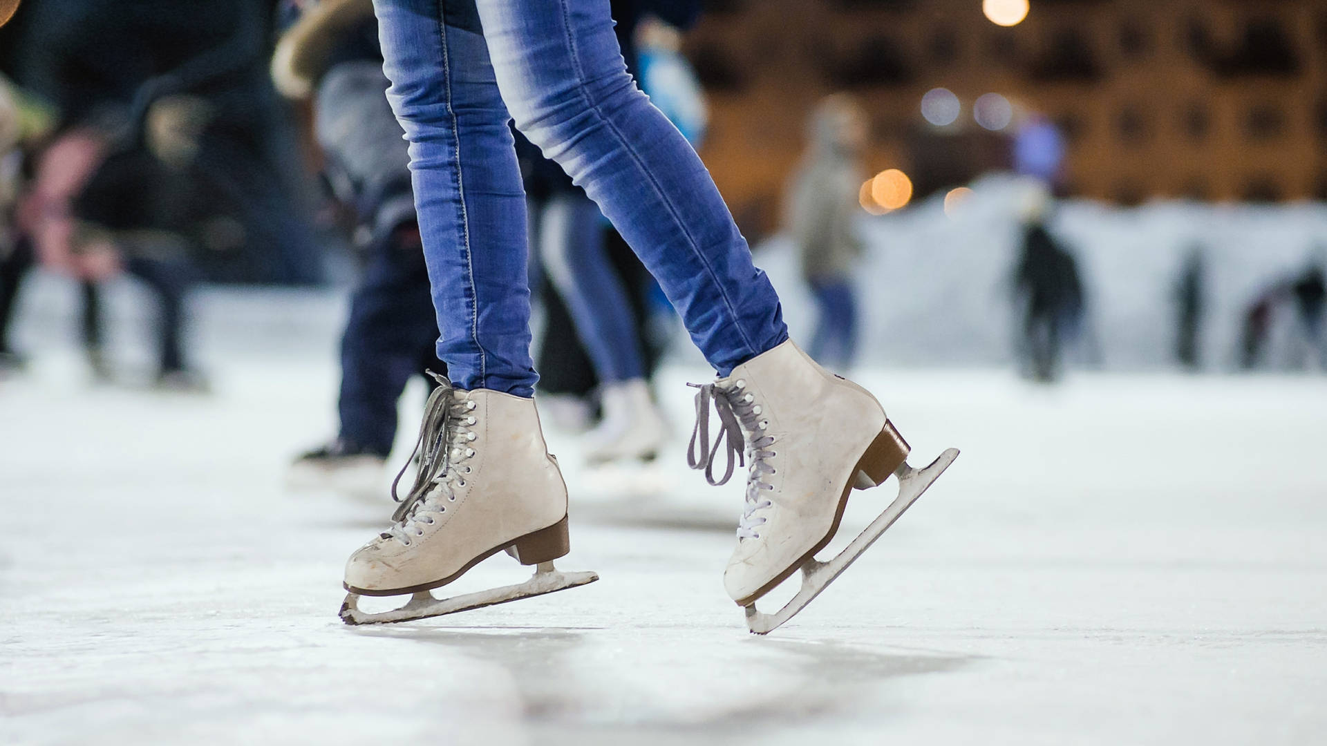 Ice Skating Shoes On Chilly Rink Wallpaper