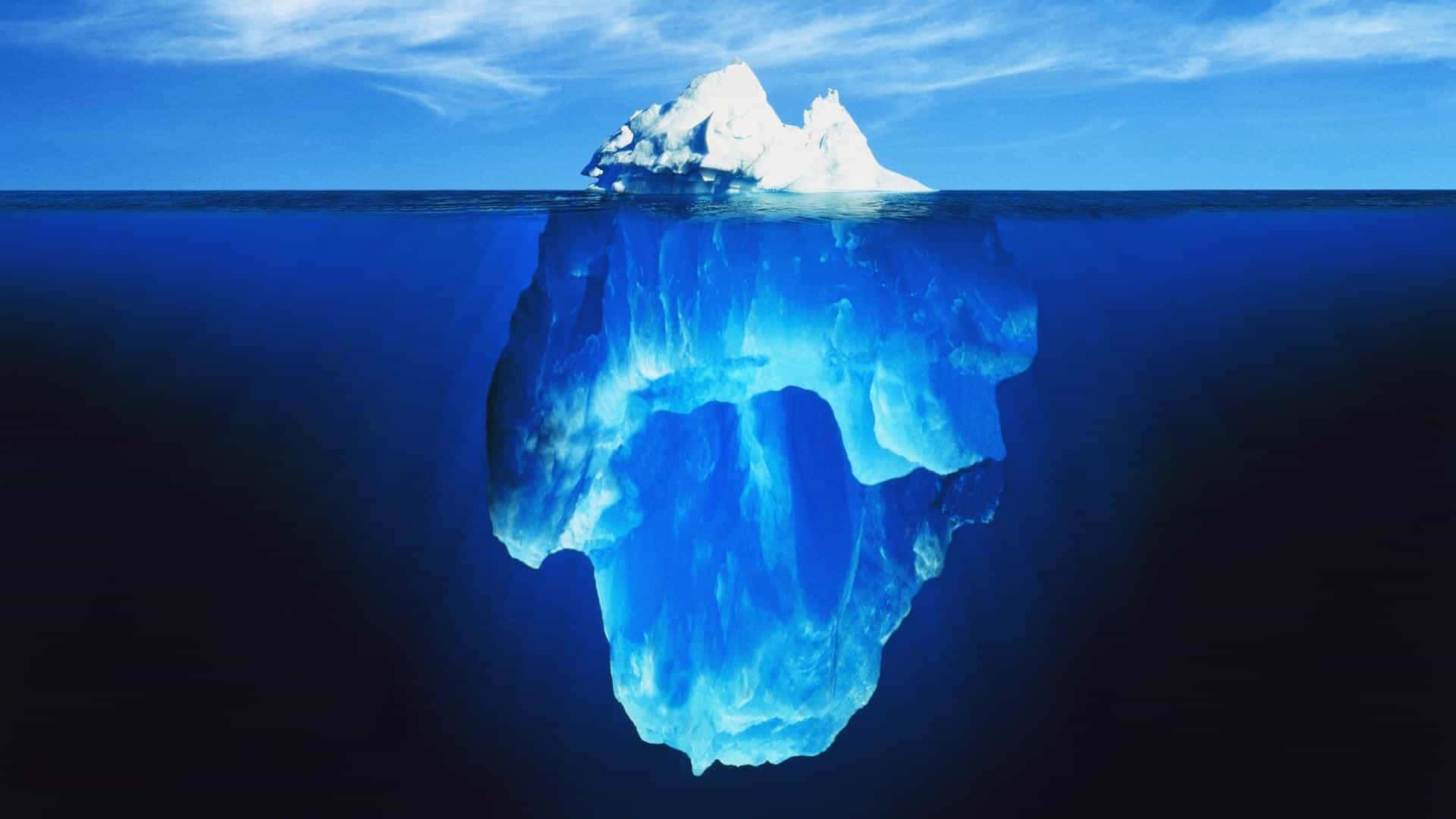 Crystal blue Iceberg in the Arctic Ocean Wallpaper