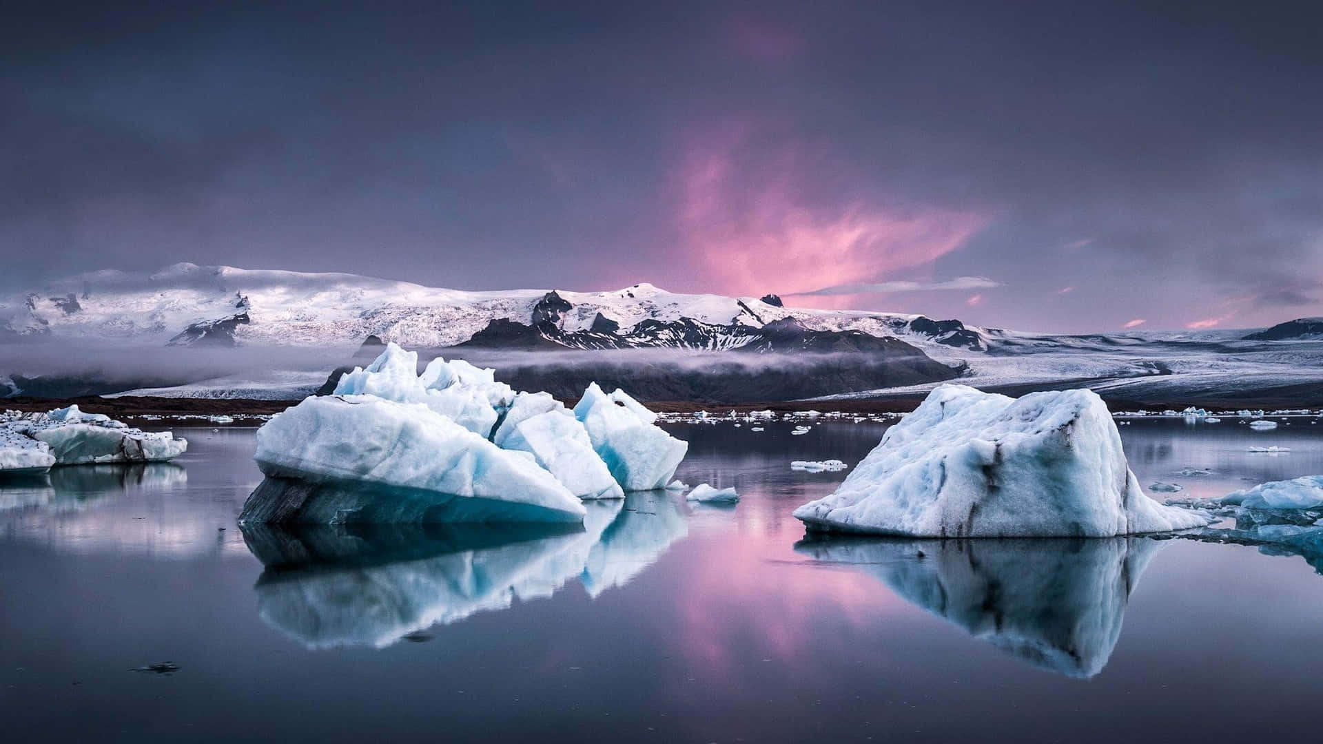 Majestic Iceberg on a Calm Sea Wallpaper