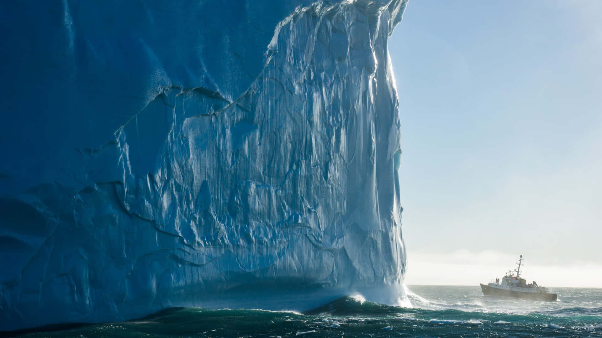 Glorious Iceberg Formation in Blue Ocean Wallpaper