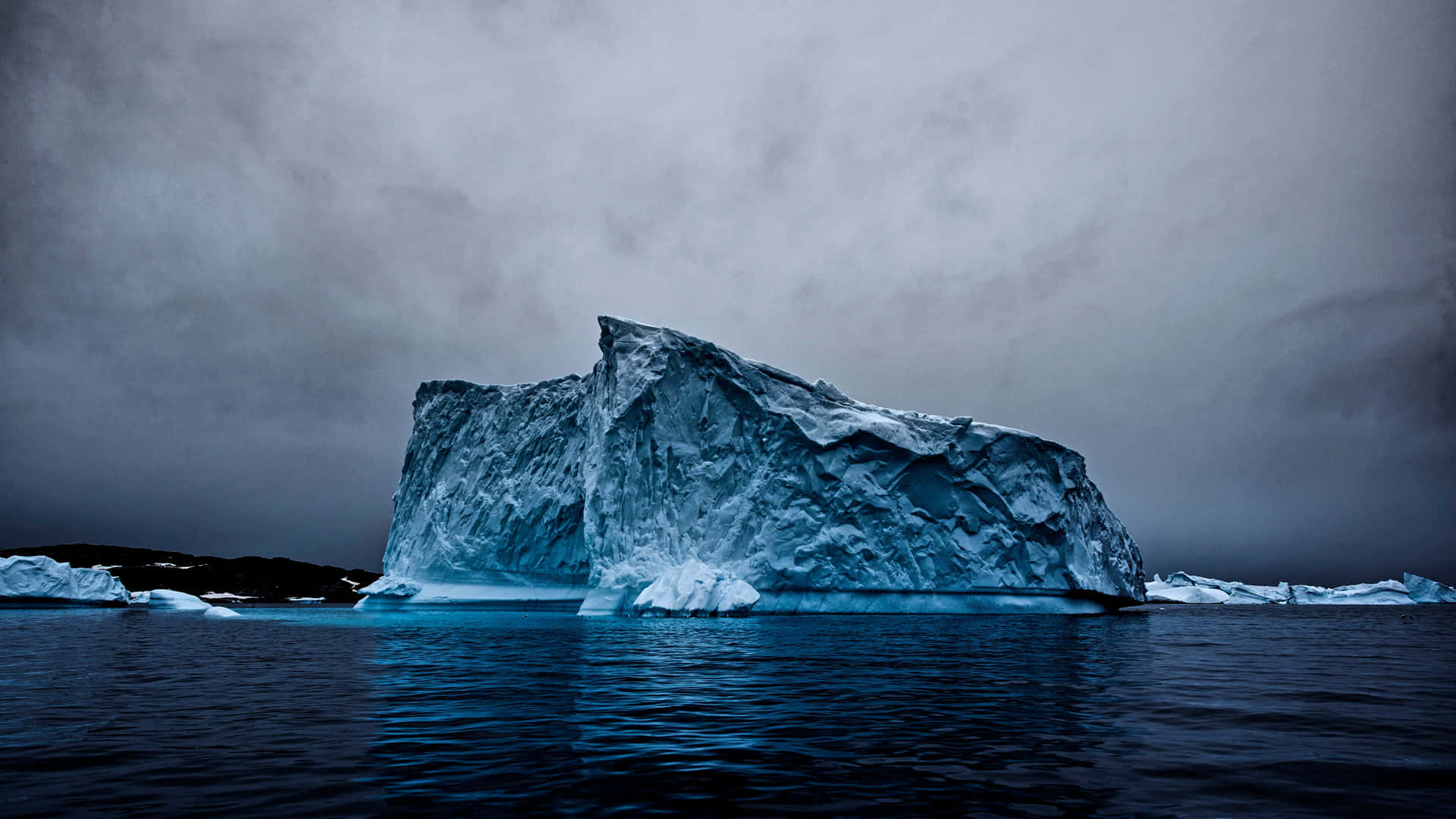 Caption: Majestic Iceberg at the Heart of the Ocean Wallpaper