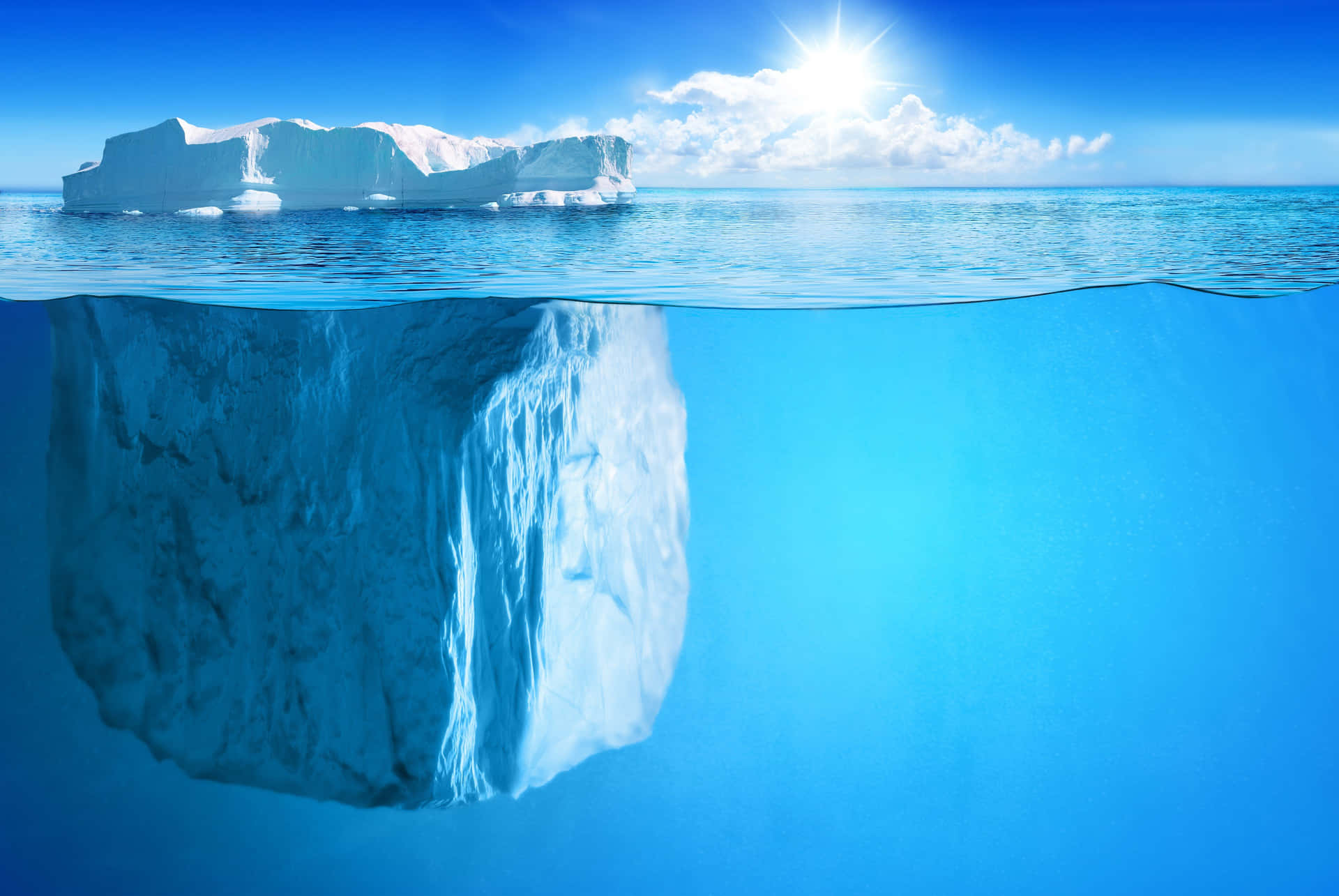 Majestic Iceberg in Pristine Waters Wallpaper