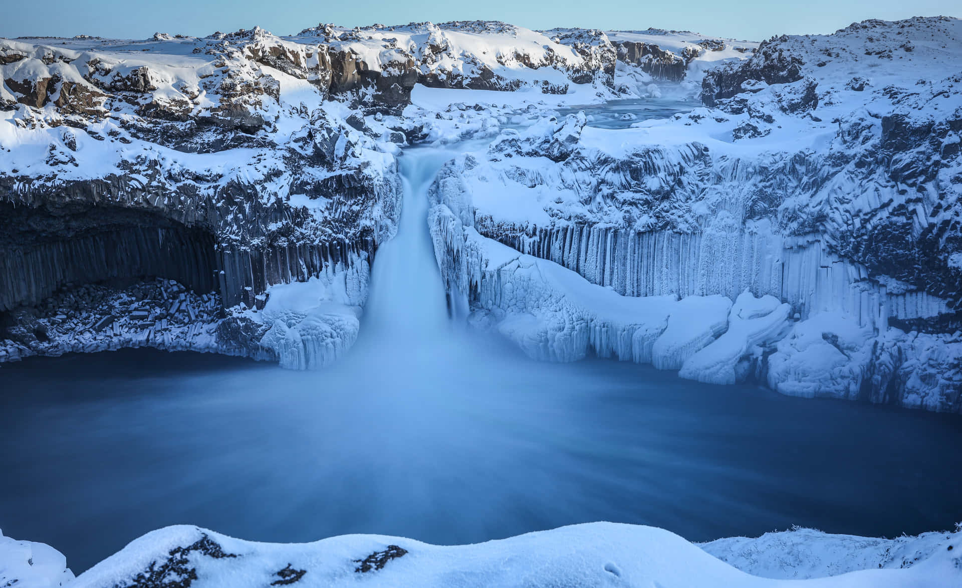 Snowy Waterfall In Iceland Wallpaper